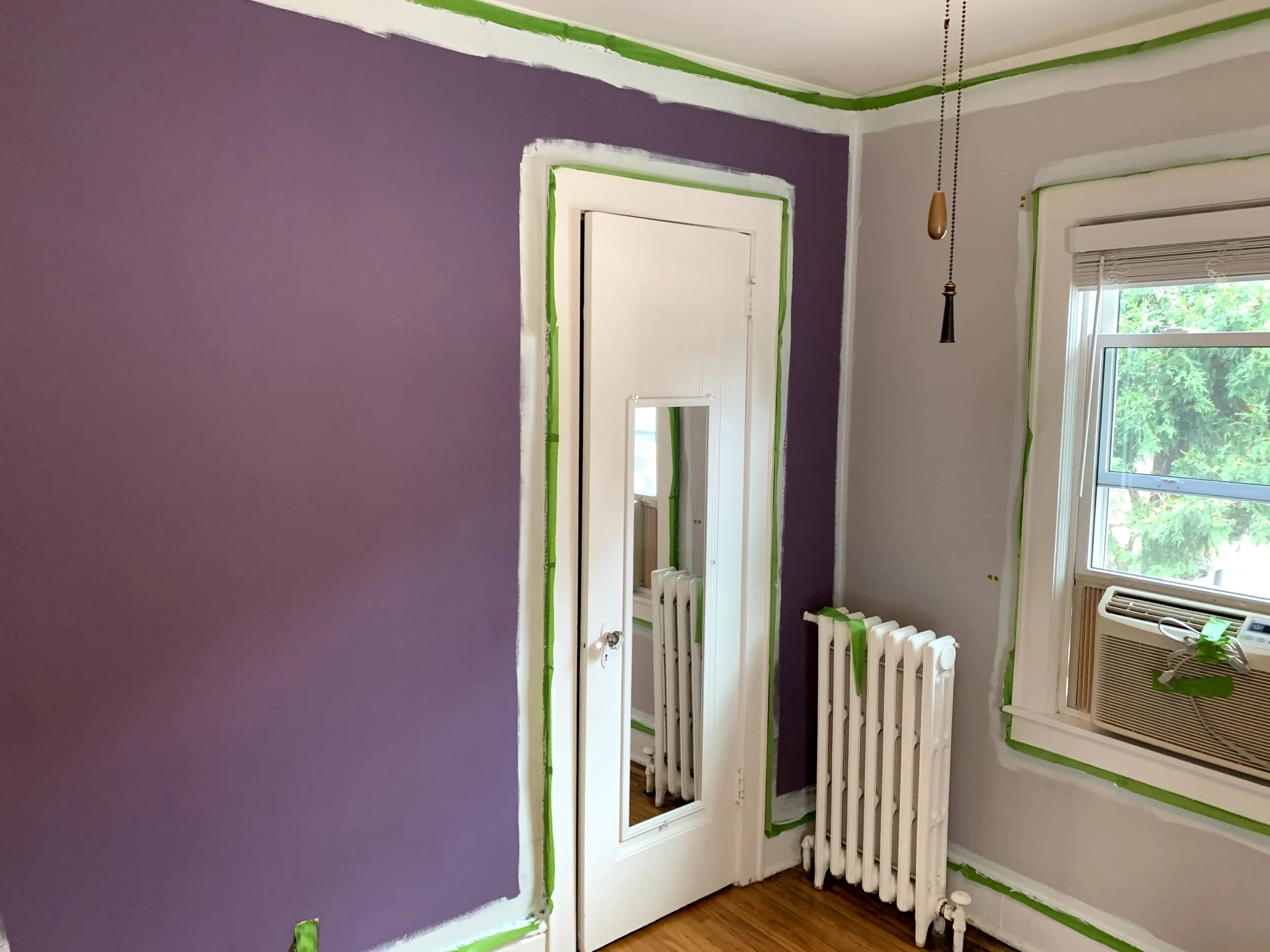The two-toned purple room had to be painted.