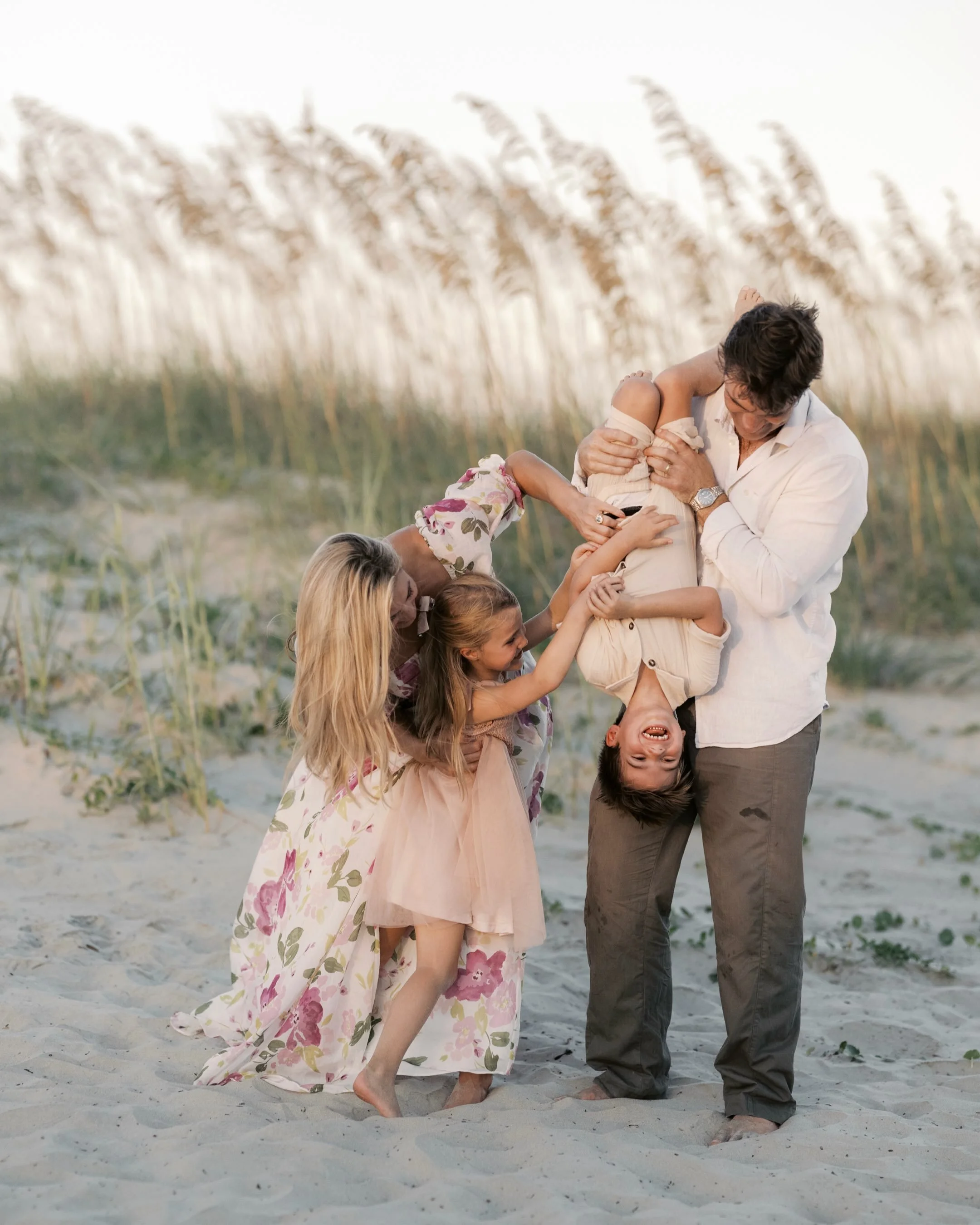 Giggles, warm sunshine, and sandy feet in the most special place to this family made for the most magical evening. I love it when the whole family joins and by the whole family I mean the pups too!✨ #charlestonfamilyphotographer #mountpleasantphotogr