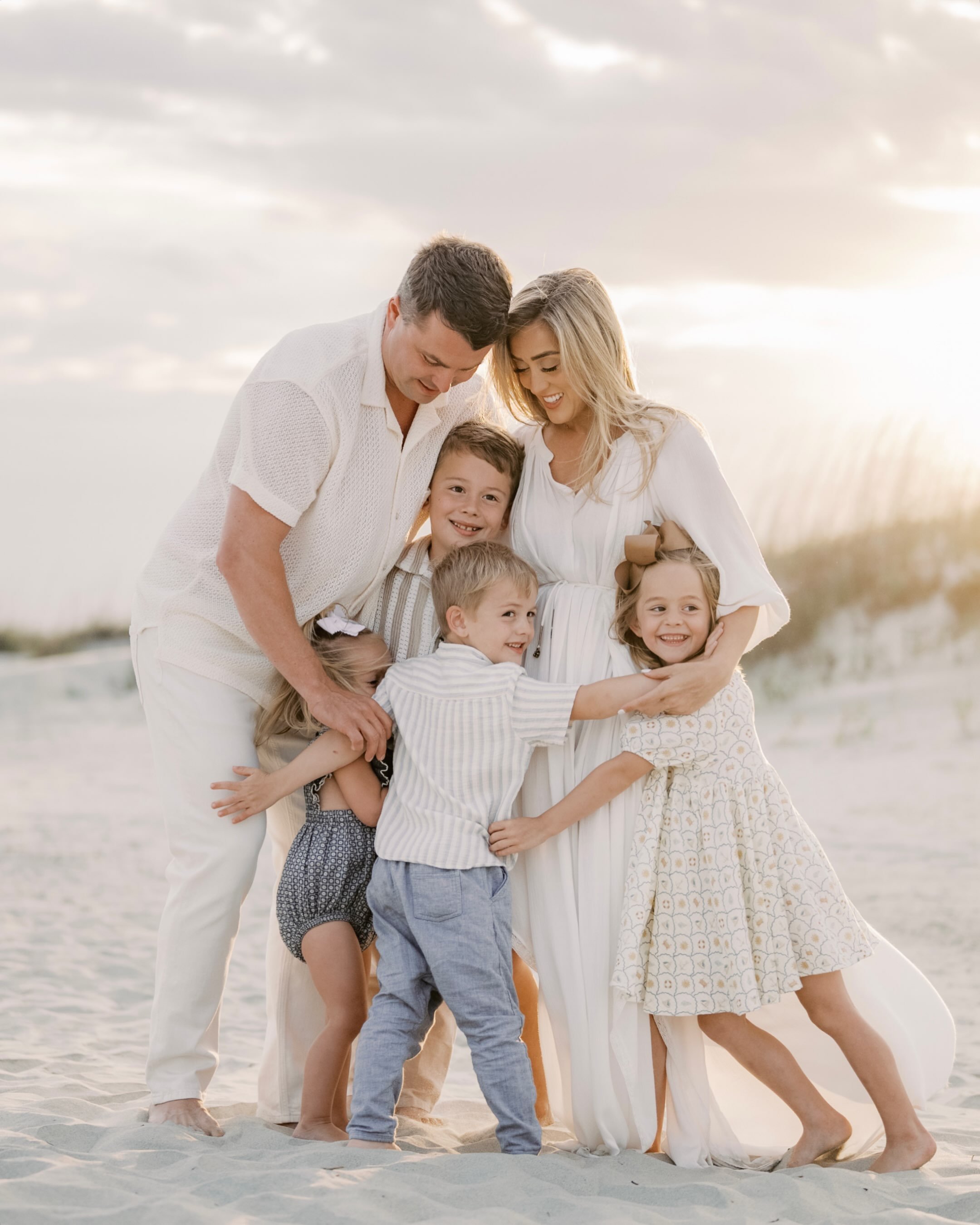 Overcast &amp; cloudy at beach never hurt anybody! We found the warmth, patches of sunlight and all the silly sweet smiles. Living for these beach sessions that feel like playtime! ☀️ #charlestonphotographer #mountpleasantphotographer #familyphotogra