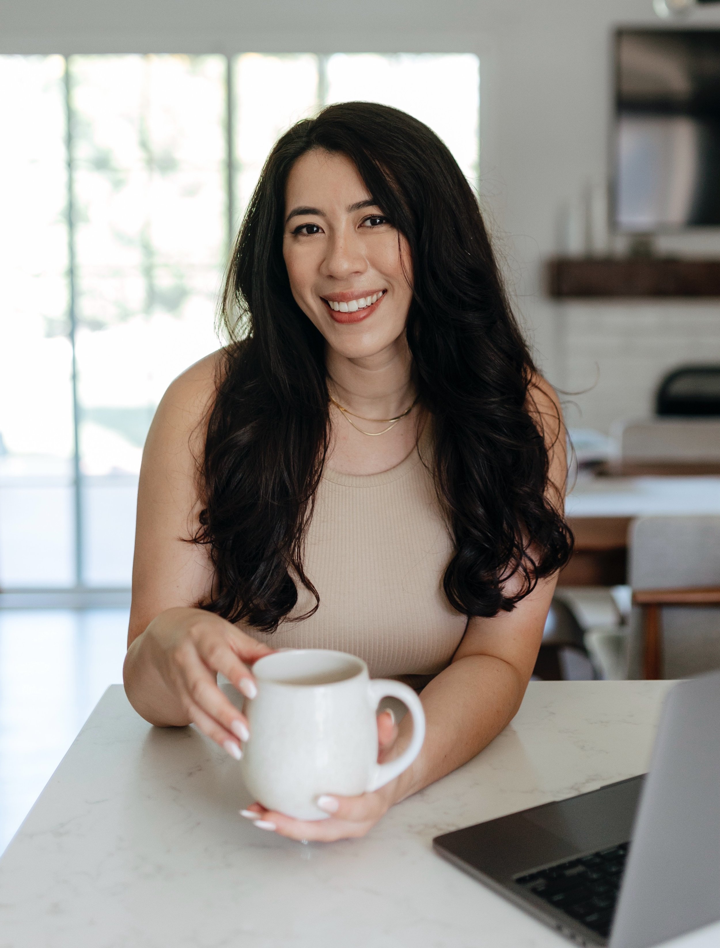 Allison Garcia headshot with mug