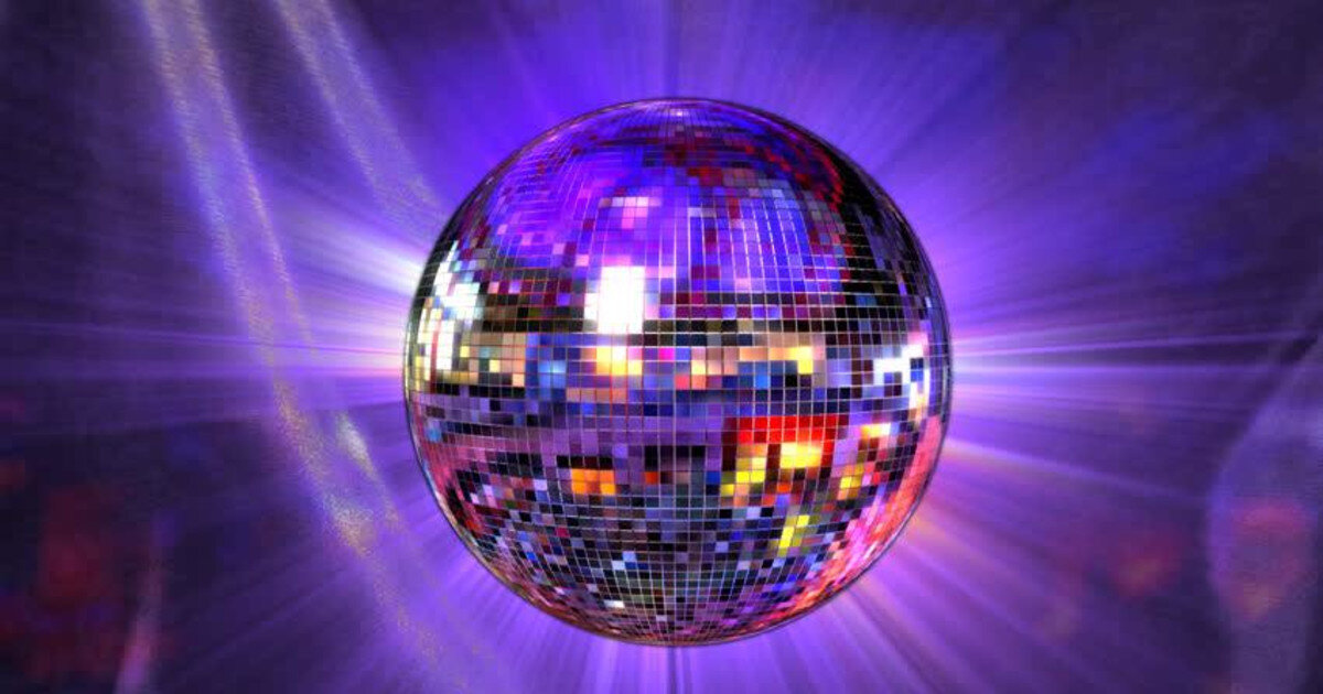 A disco ball in a purple backdrop