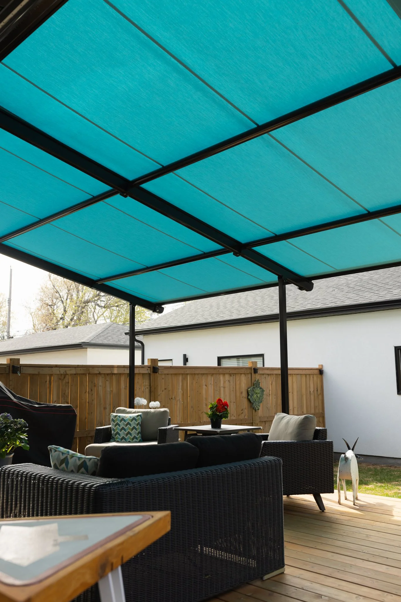 a pergolino by stobag installed by Alberta tent and awning on a Calgary home patio