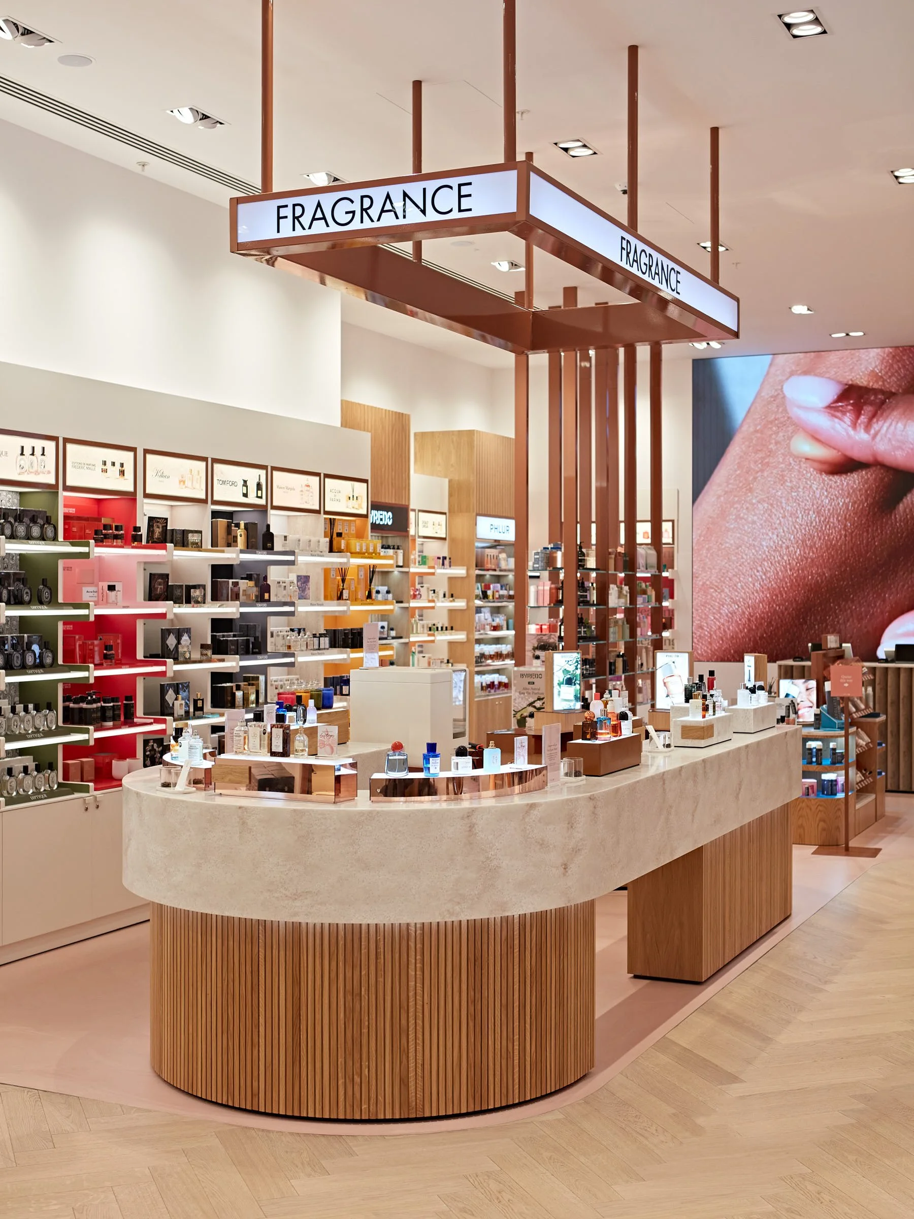 Space NK Fragrance Discovery Bar, bespoke retail tables, luxury fragrance display, retail fixture manufacturing, customer journey design, tactile retail experience, premium beauty counter, Alterd.co.uk.