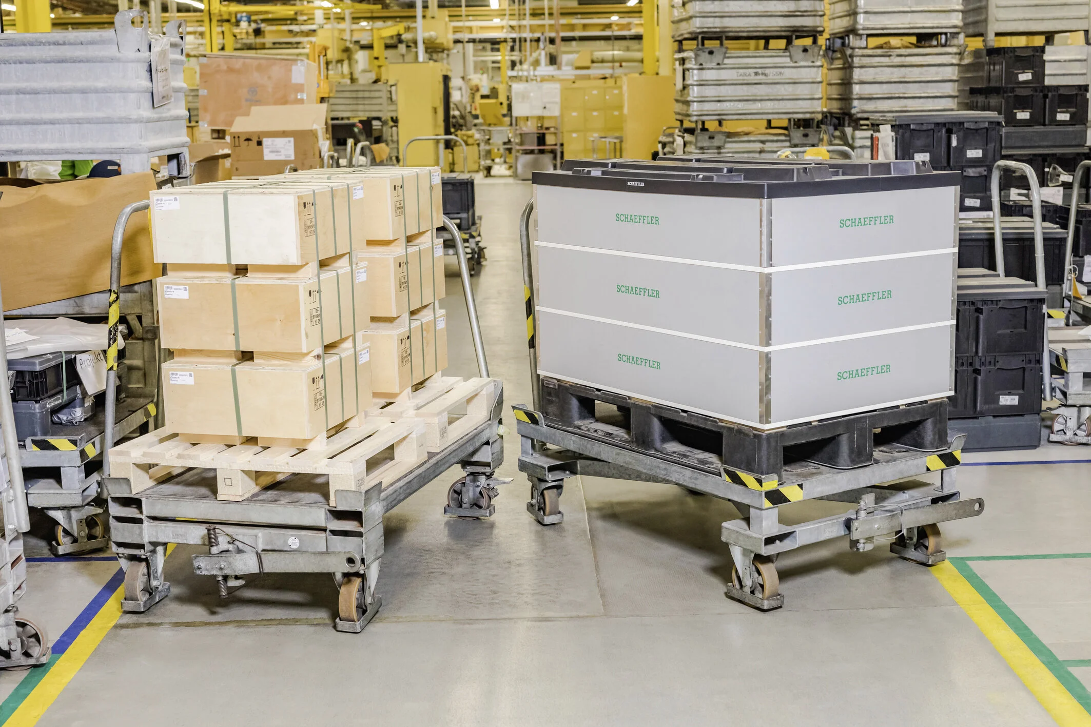 One complete unit of the new packaging system (right) replaces a multitude of individual boxes across several pallets. A total of up to five frames can be stacked per pallet with up to three bearings stacked per frame.