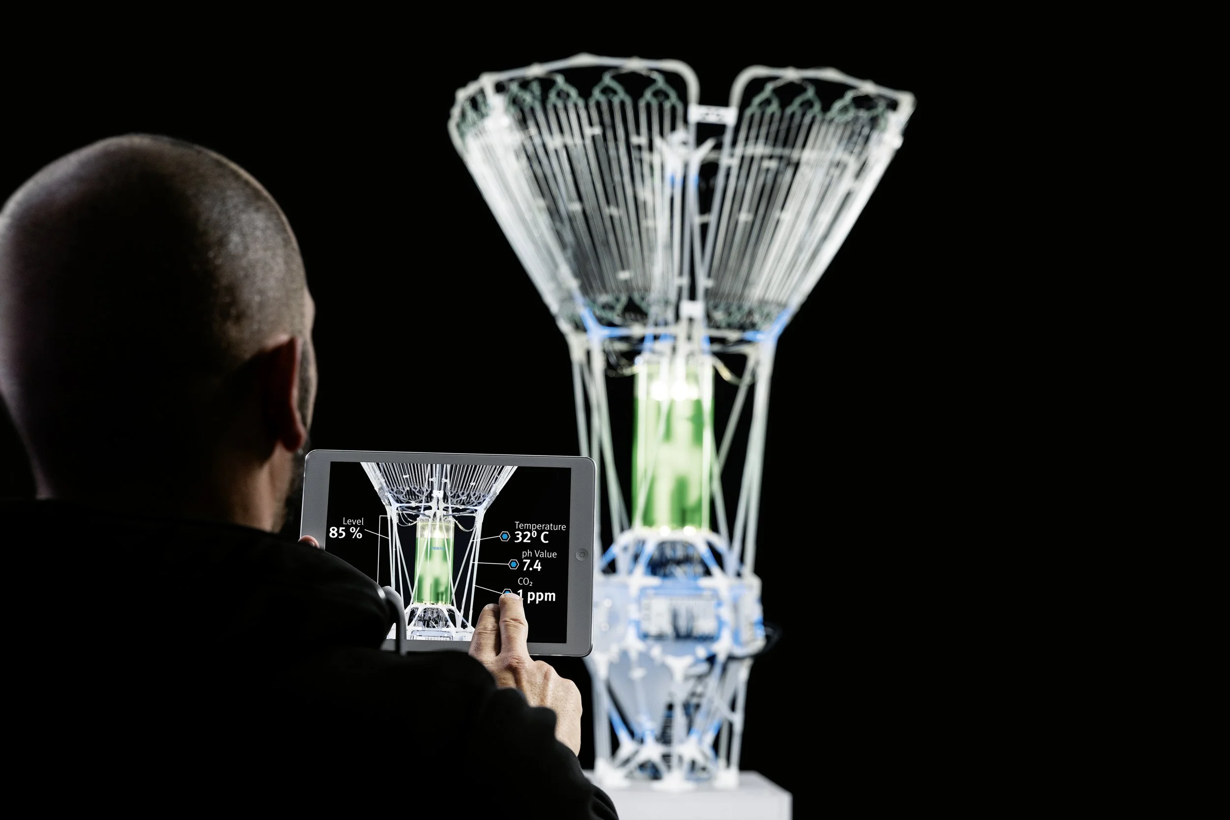 An augmented reality application for mobile devices allows changes to parameters to be made remotely.