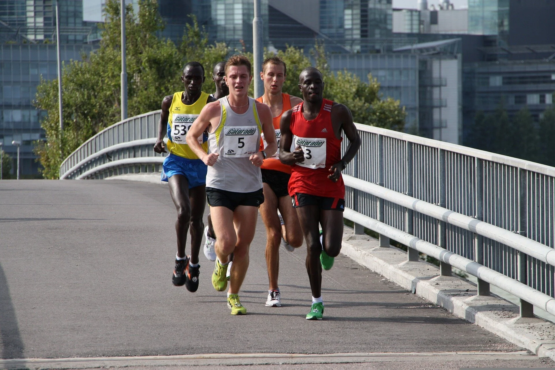Optimizing pacer formations in front of marathon runners to reduce run times