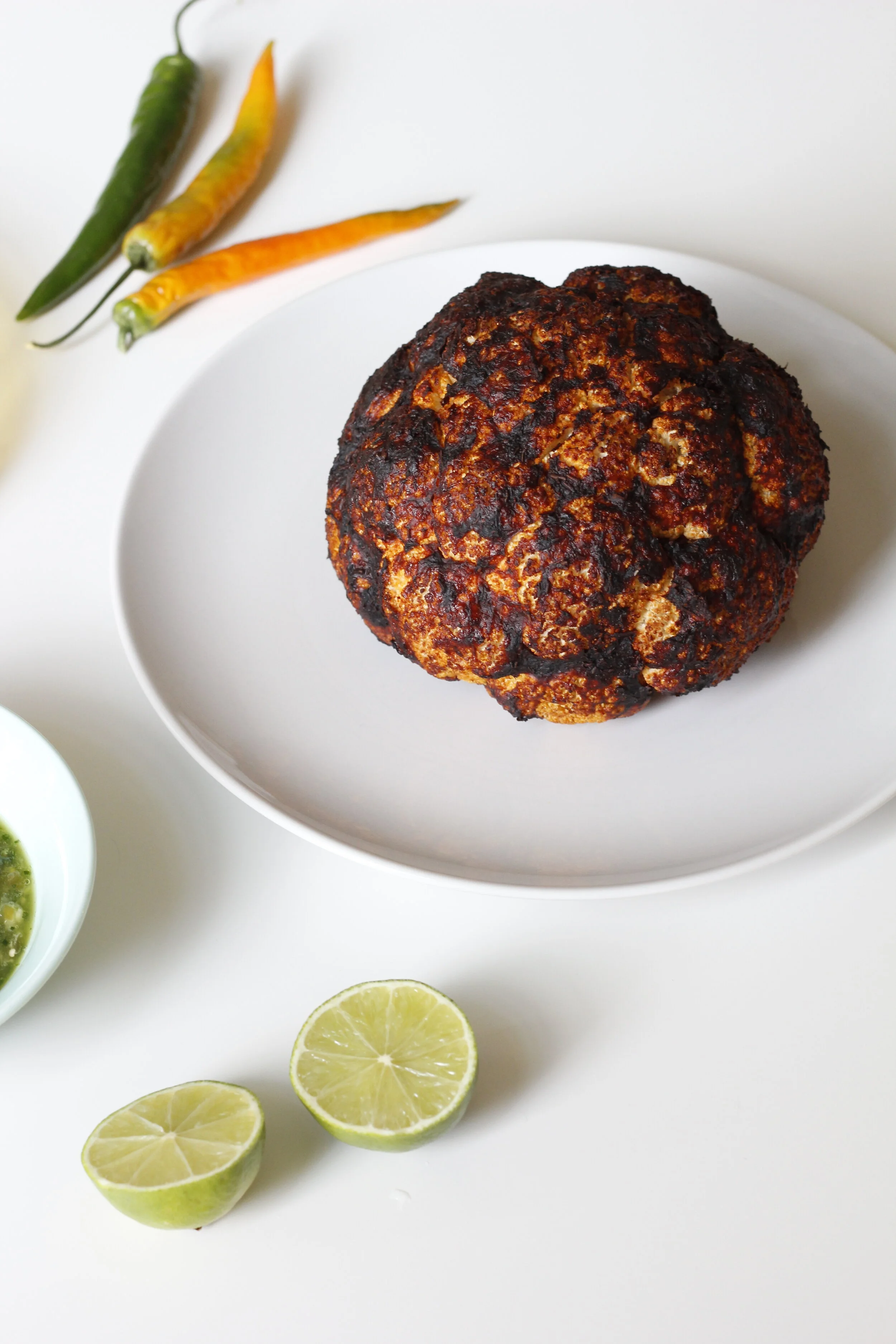 Whole roasted cauliflower in anchochile adobo sauce — Plate Talks