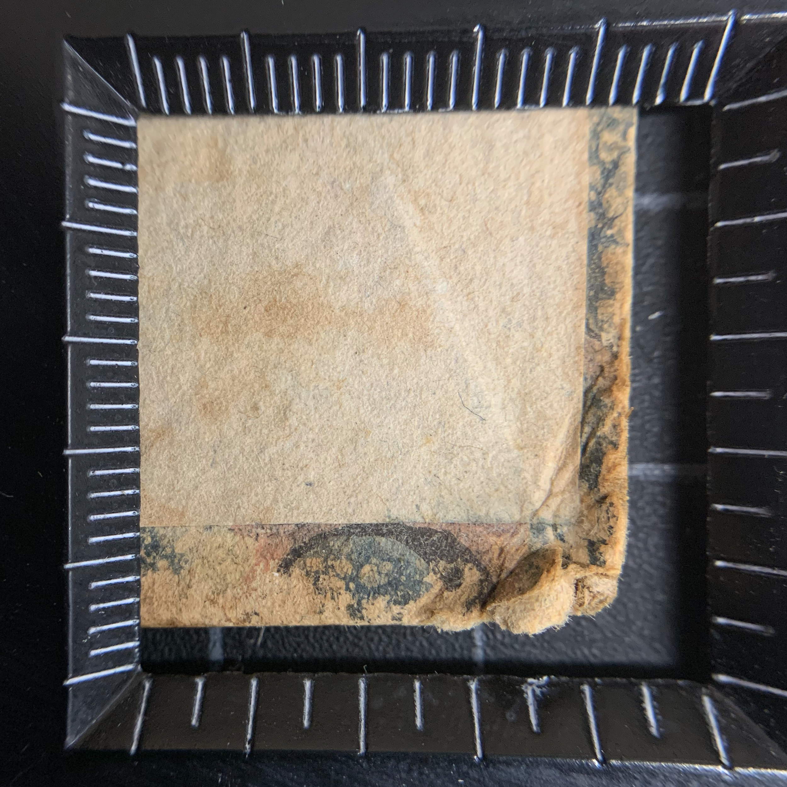 The pleated corner, and an excellent unfaded patch of the Stormont marble’s pink vein.