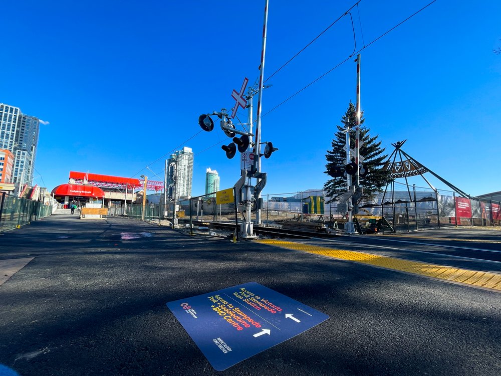 New pedestrian crossing and Victoria Park/Stampede Train Station access at 17th Avenue and Macleod Trail SE