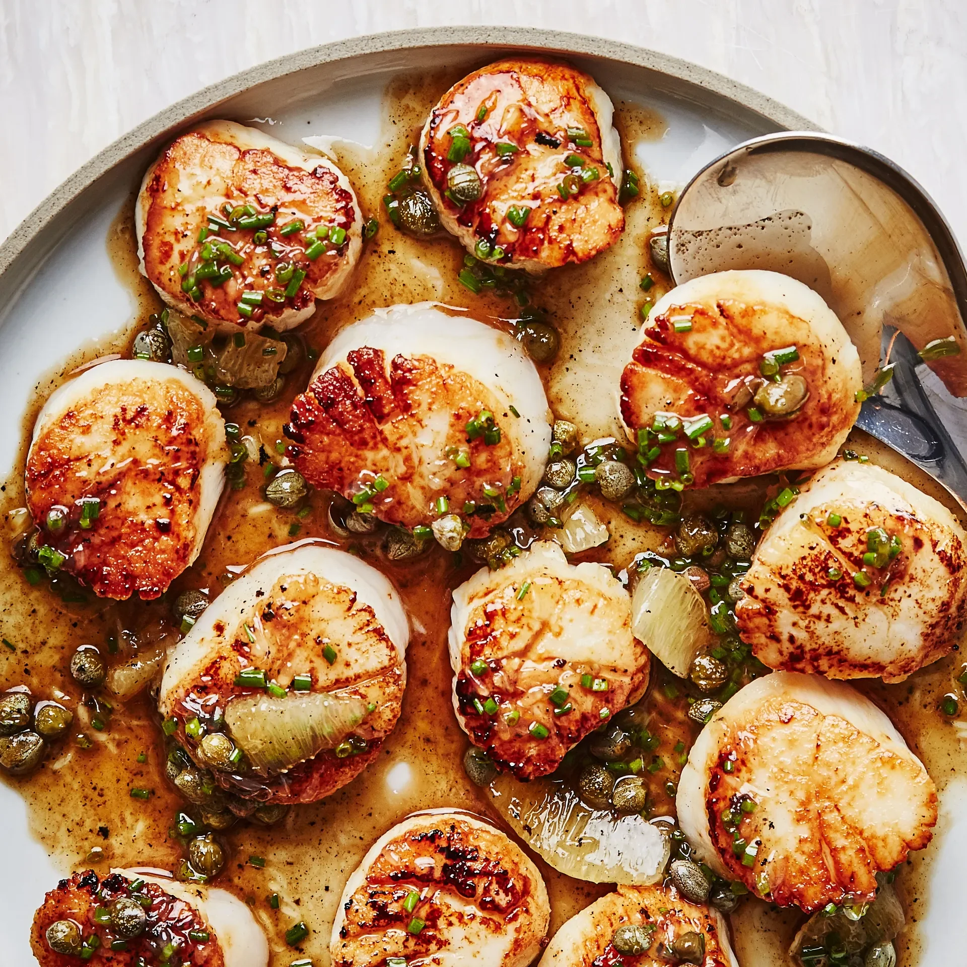 seared-scallops-with-brown-butter-and-lemon-pan-sauce.webp