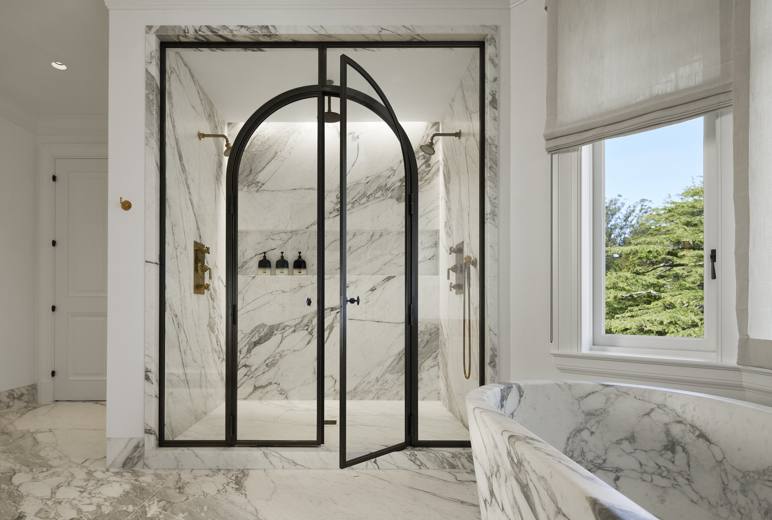 Arabescato Marble Tub + Surfaces  | Bronze Shower Doors