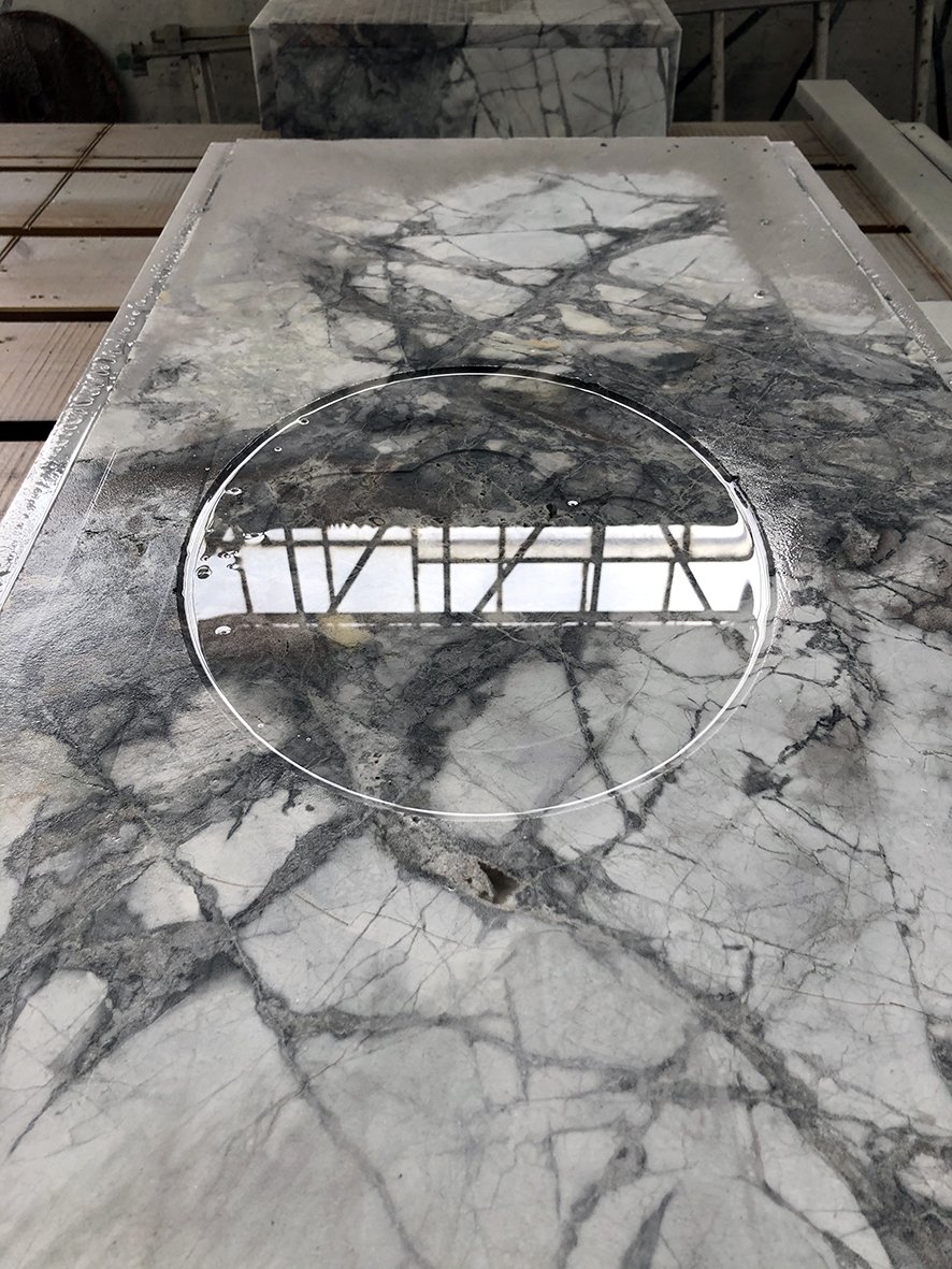 custom white invisible grey gold marble vanities for a san francisco project