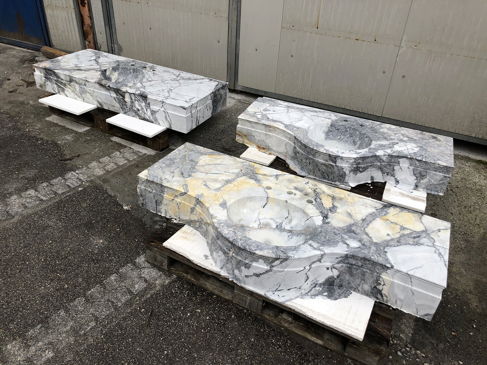 custom white invisible grey gold marble vanities for a san francisco project