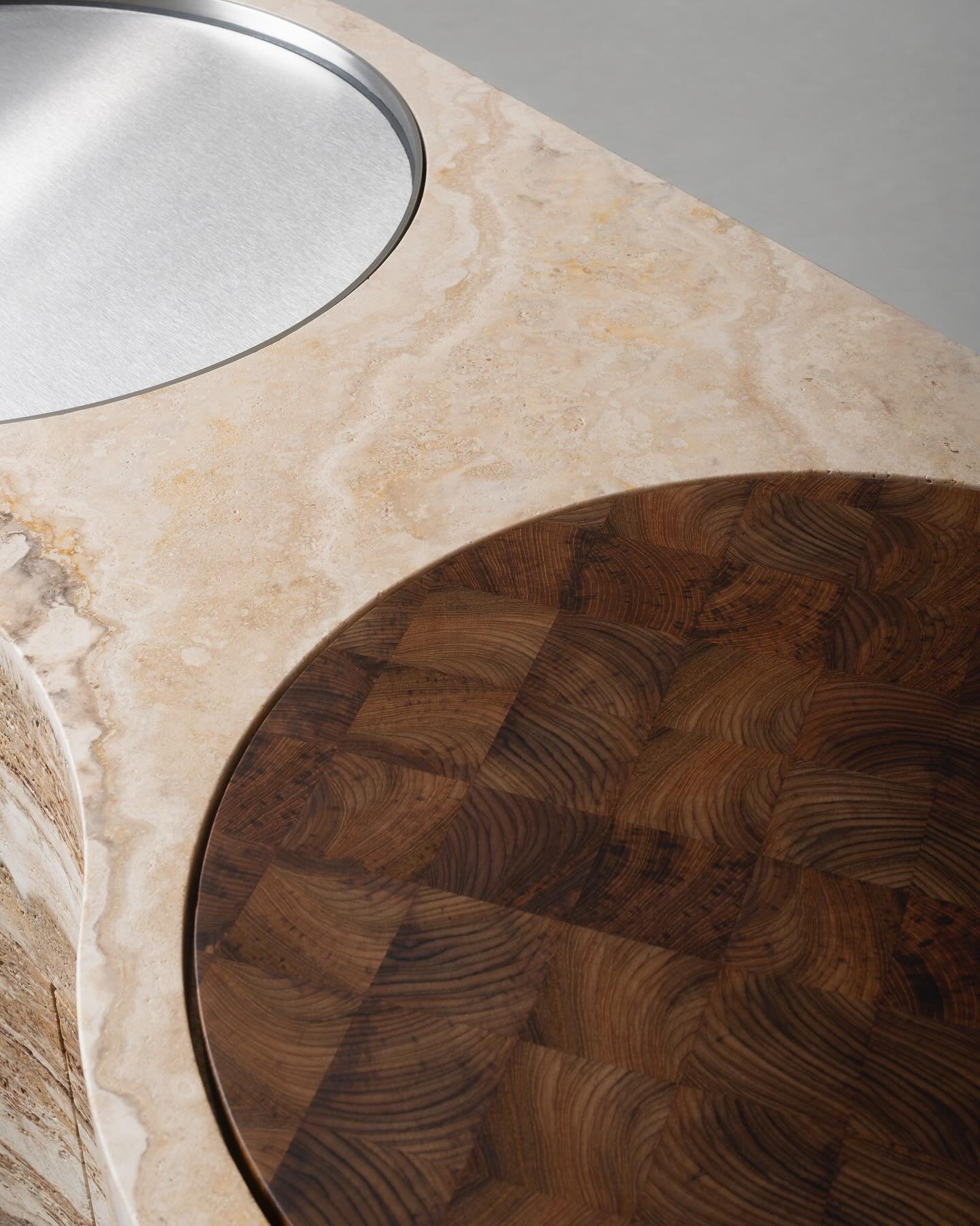 The semicircular JUNE design, carved with soft, curved lines, is formed around the user to create a seamless and edgeless kitchen workspace. This piece is completed in Tuscan Travertine. 

Designed + crafted by @vaselli_marmi and @kensakuoshiro 

#st