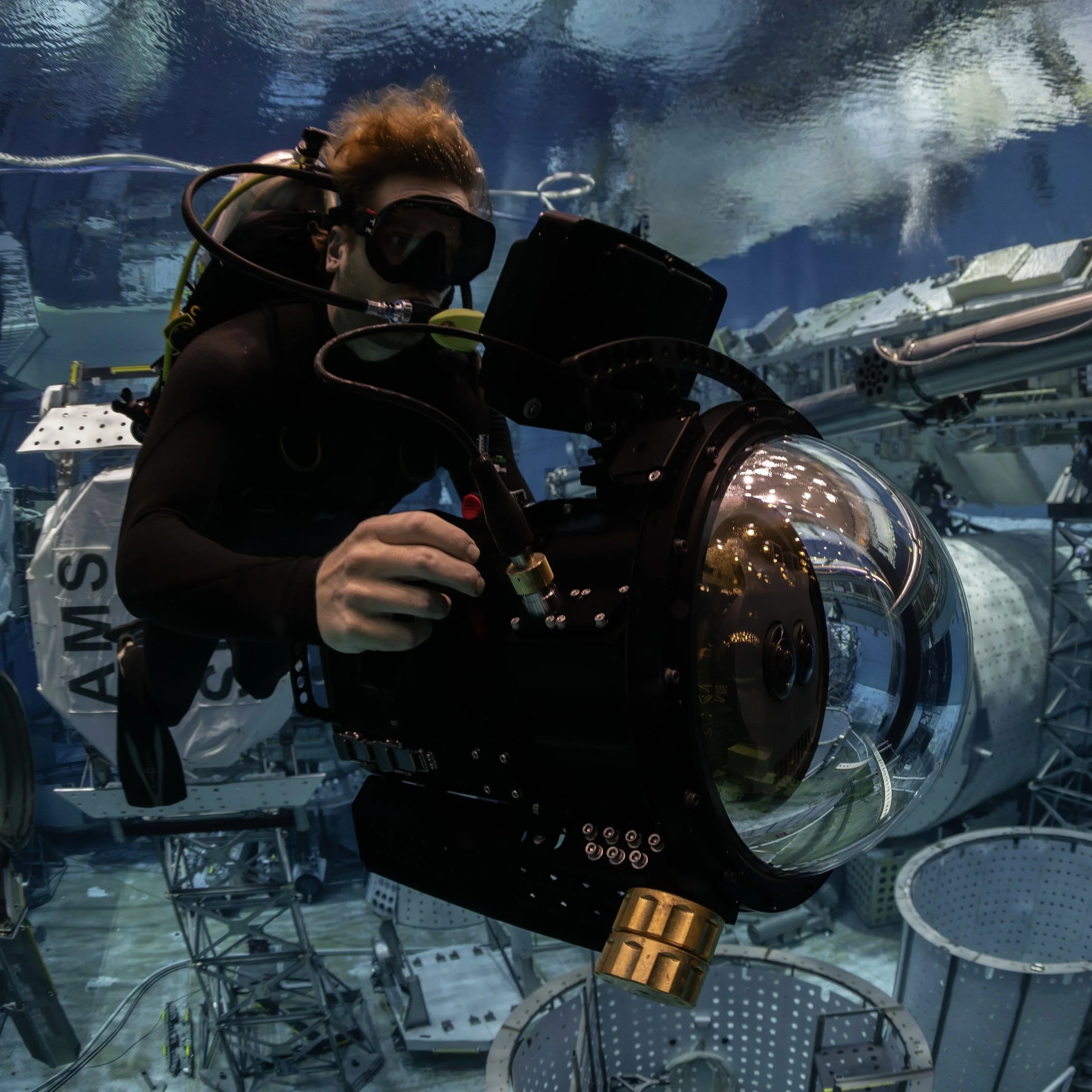 Trent Ellis Diving at the NASA NBL with the Gates underwater housing for the black magic immersive camera. Photo Shot by Austin Novy.