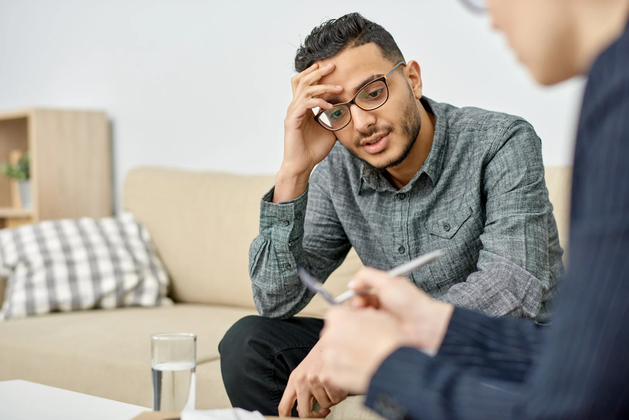 Professional receiving support during executive rehab