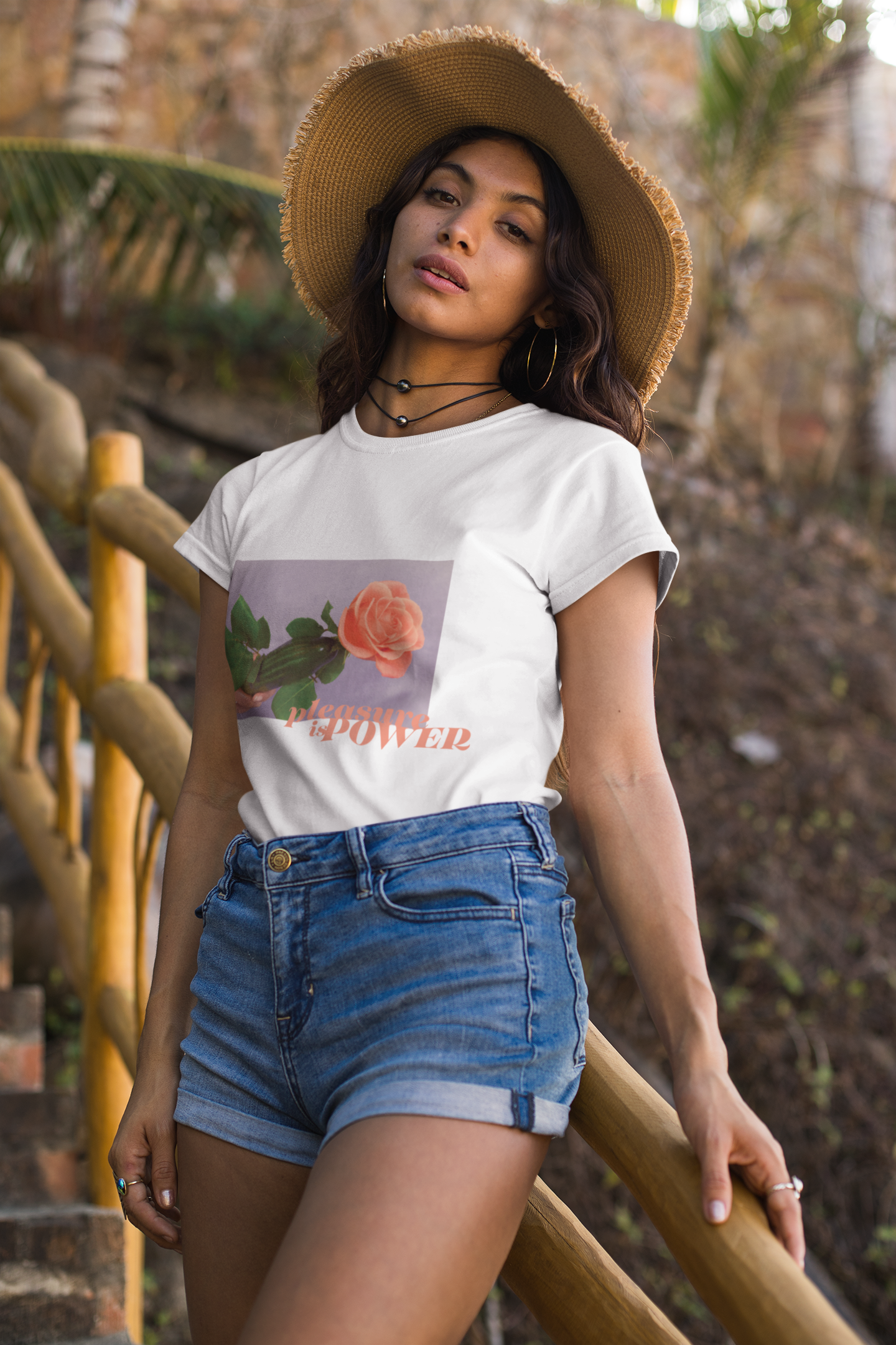 tee-mockup-of-a-young-woman-with-a-floppy-hat-on-a-staircase-26810.png