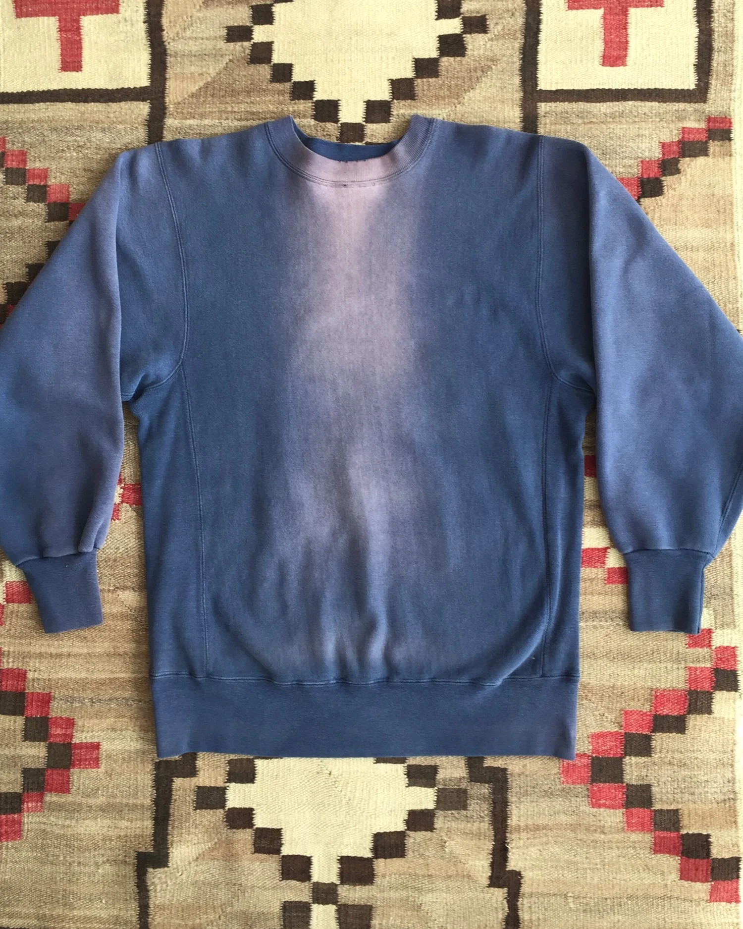 Faded top blue sweatshirt
