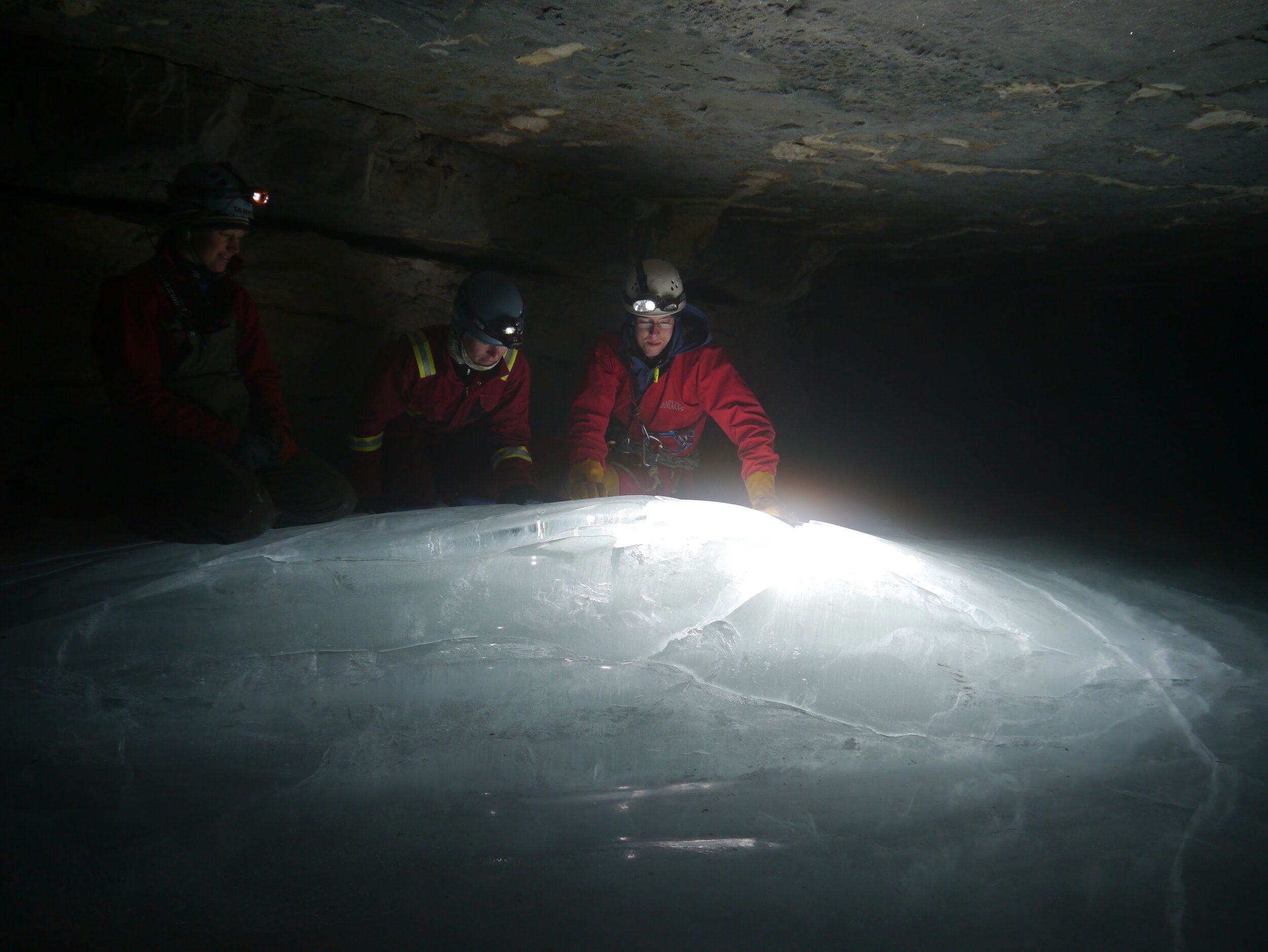 Tammera Kostya, Alyssa Horn, and Chris Coxson at an ice pingo in Castleguard Cave Photo: C. Stenner 2012
