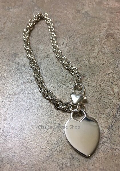 STERLING SILVER CHARM BRACELET