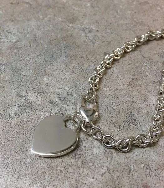 STERLING SILVER CHARM BRACELET
