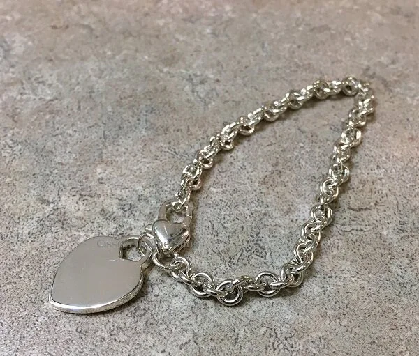 STERLING SILVER CHARM BRACELET
