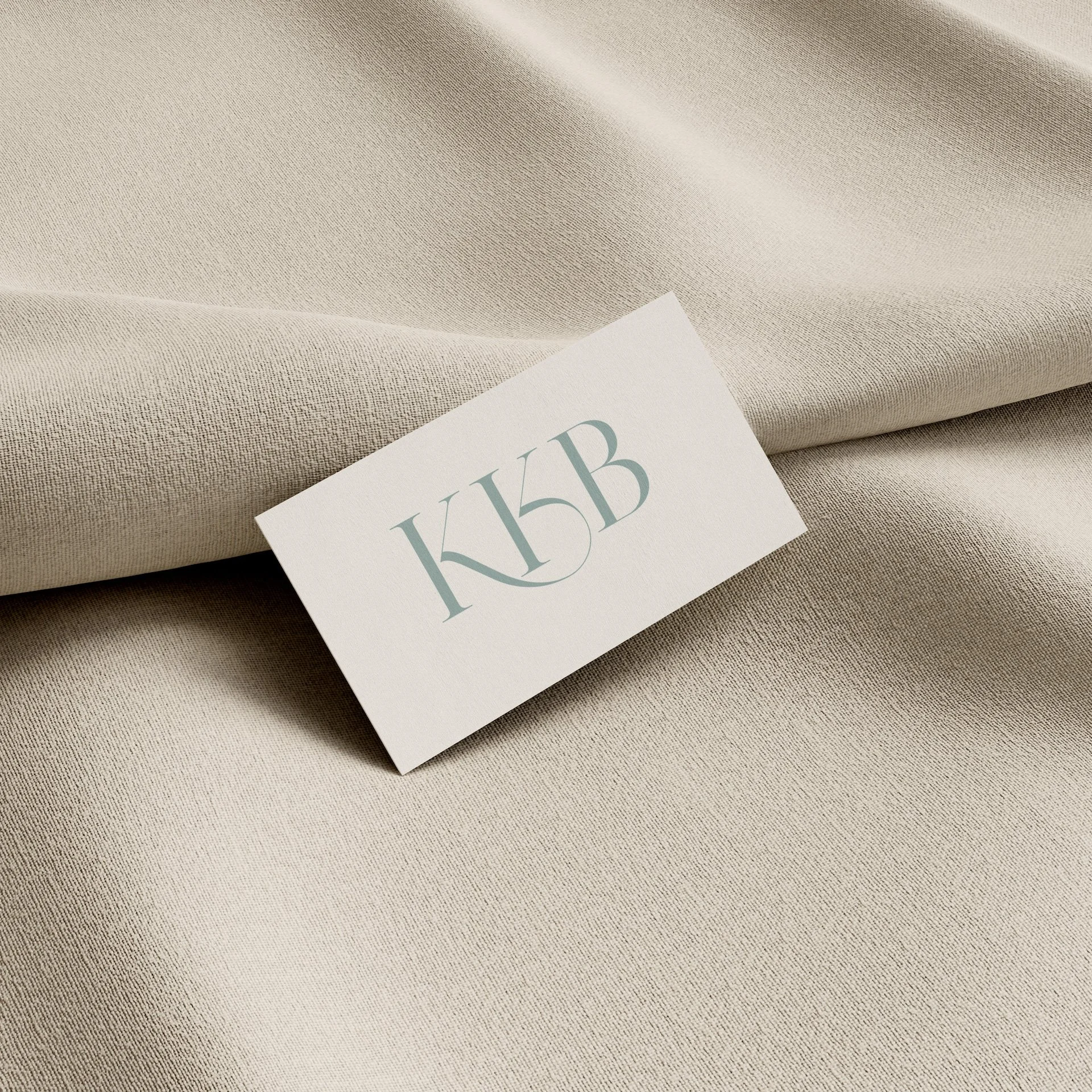 Luxury wellness brand identity featuring an elegant logo design and premium business card mockup created by VICI Studio.