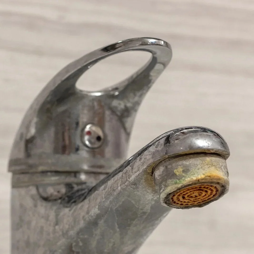 What Causes Hard Water Scale Buildup in Pipes and Fixtures?