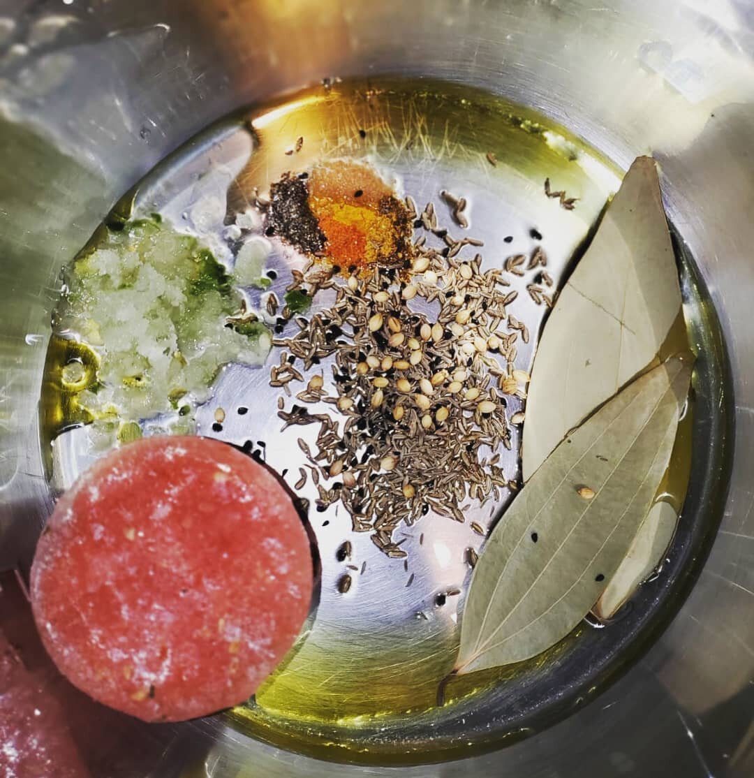 The birth of just about every North Indian dish starts with the same ingredients.
.
.
.
Pureed and froze the tomatoes and had the onion/garlic/ginger/chillies mix ready in advance for days of ennui and desire for ease. It cut the time to make this me