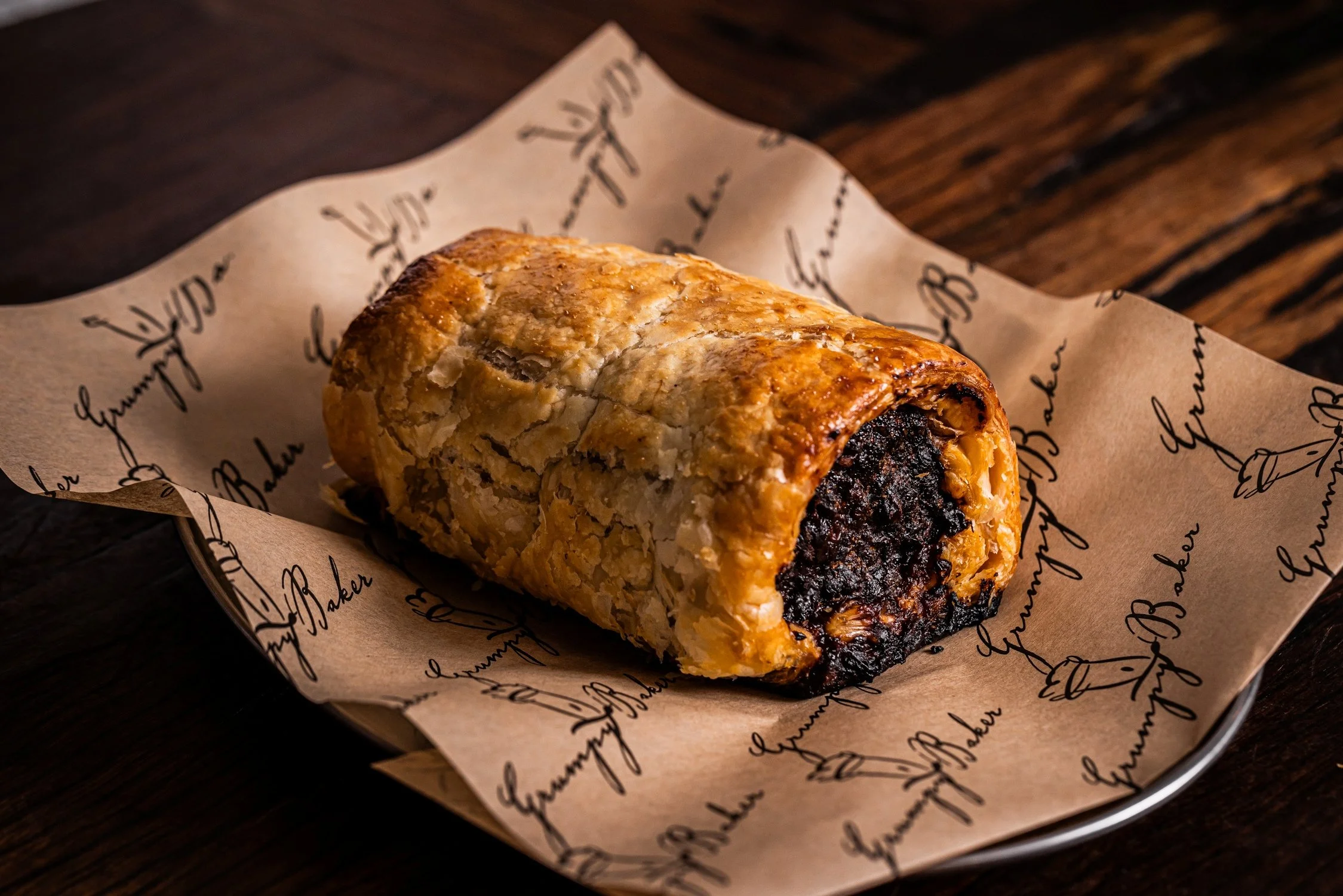 The Grumpy Baker sausage roll single.jpg