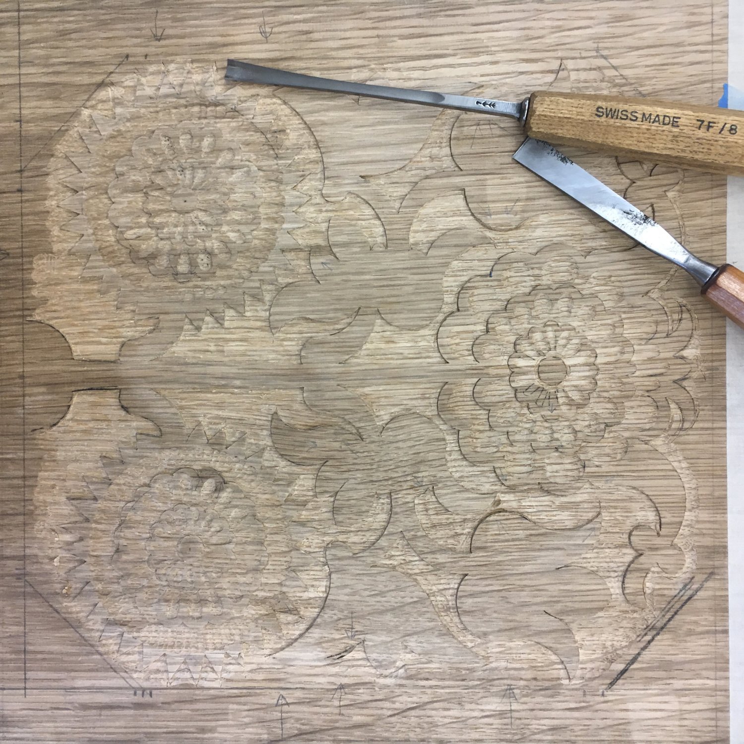 SunflowerCabinet_CarvingDetails1_AspenGolann.jpg