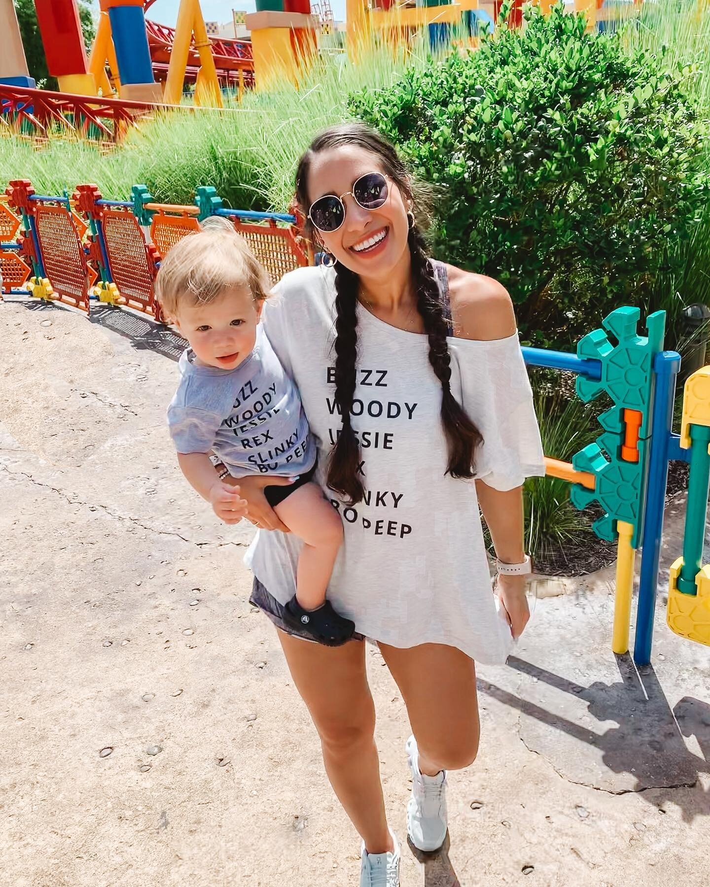 matching shirts with my little bud 🤘🏽(peep his little leg rolls &amp; crocs 🥹)
&mdash; 
I did some heavy research on doing Disney with a toddler (in July 🥵), and I was *pre 👏🏼 pared* 👏🏼 Lol! 

Our trip could not have gone better. We had every