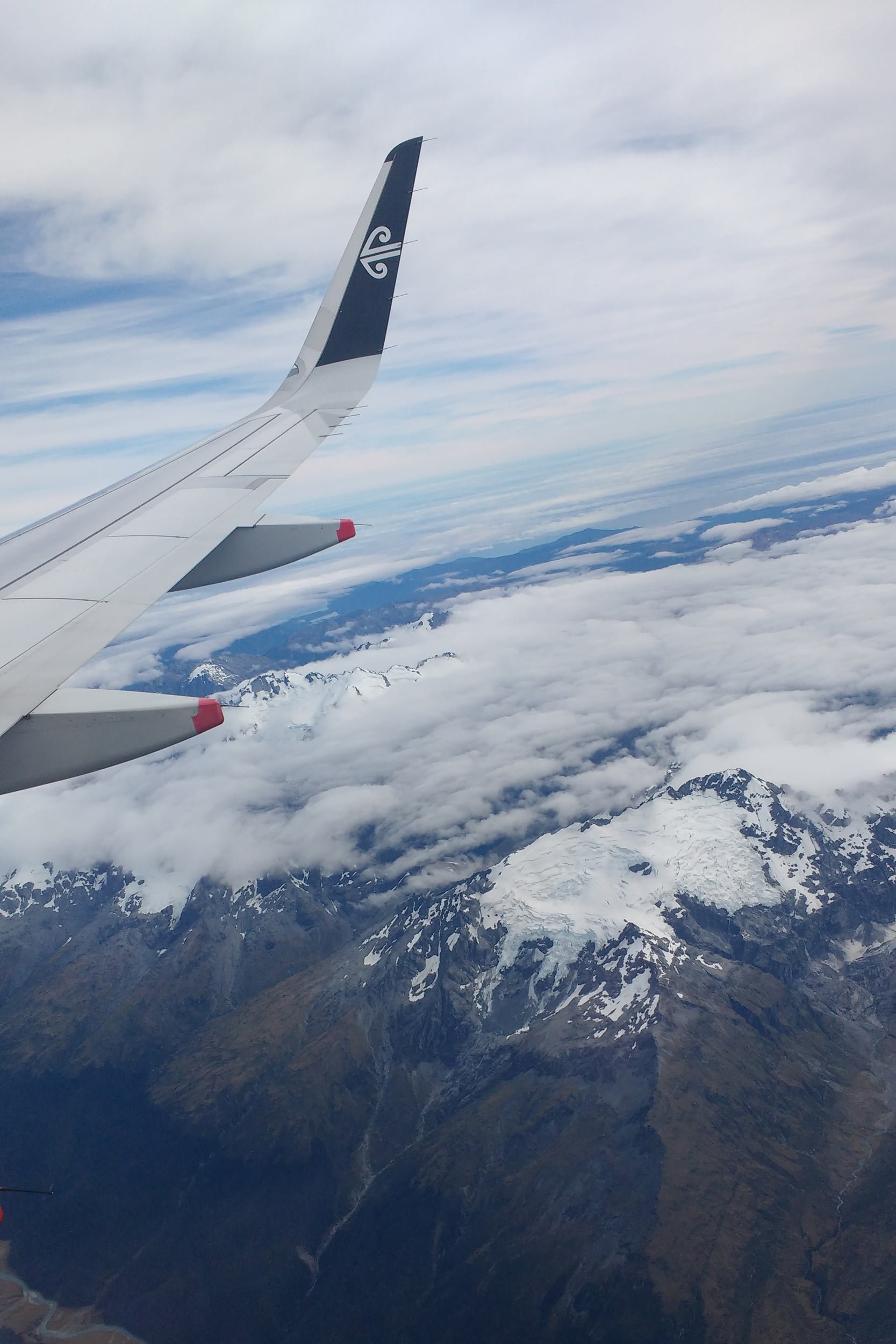 air-new-zealand-air-plane-above-the-mountains
