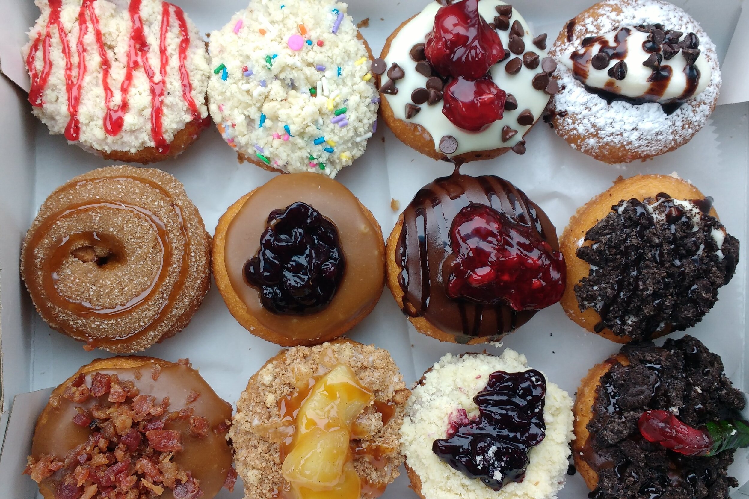 These particular doughnuts came from Peace, Love and Little Donuts, in Buffalo, NY.
