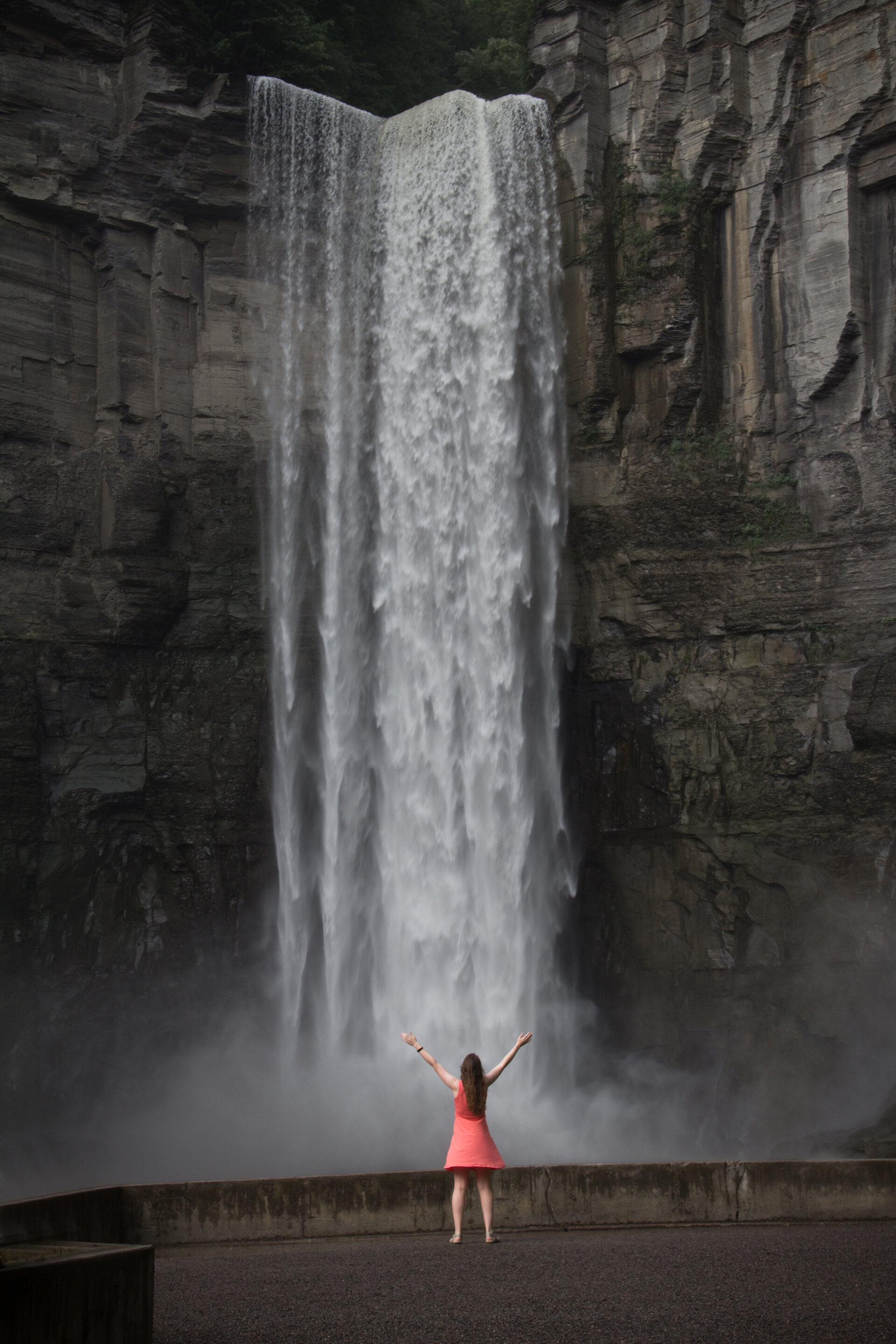standing-at-the-base-of-taughannock-falls-ithaca-ny