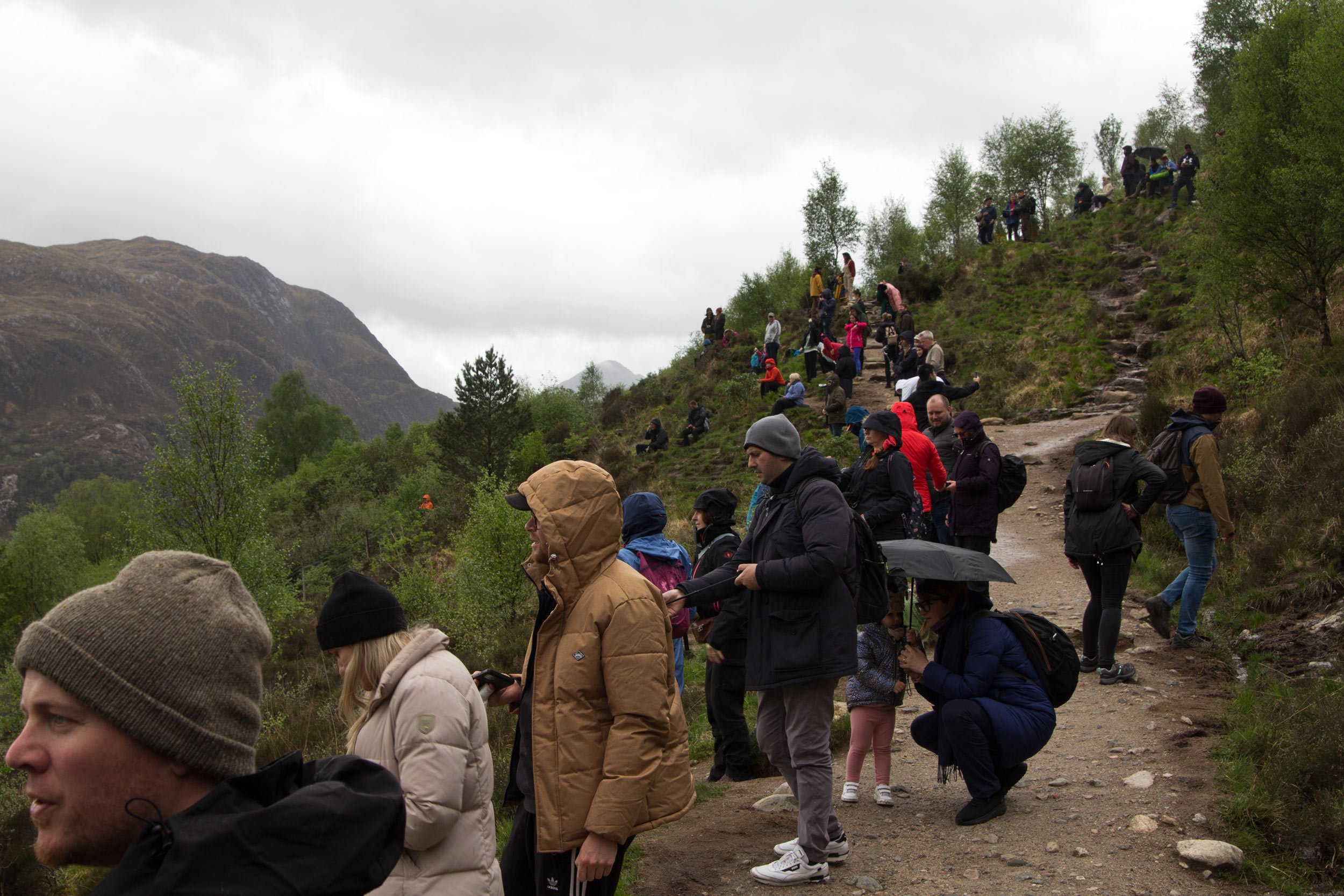 crowds-waiting-for-steam-train-to-cross-glenfinnan-viaduct