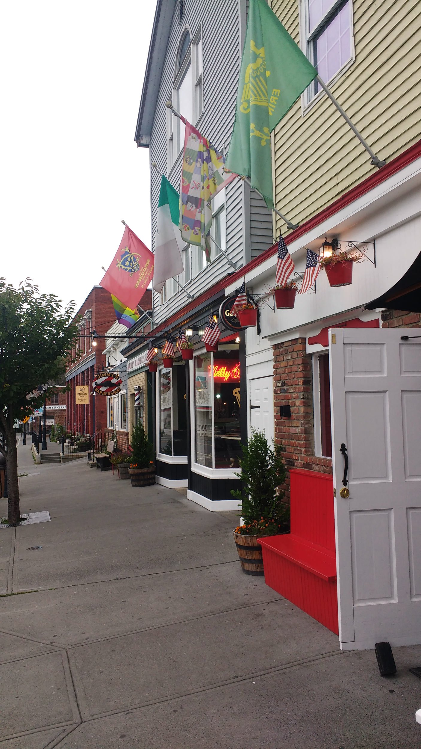 cute-shops-and-flags-in-a-downtown-street-in-new-miliford