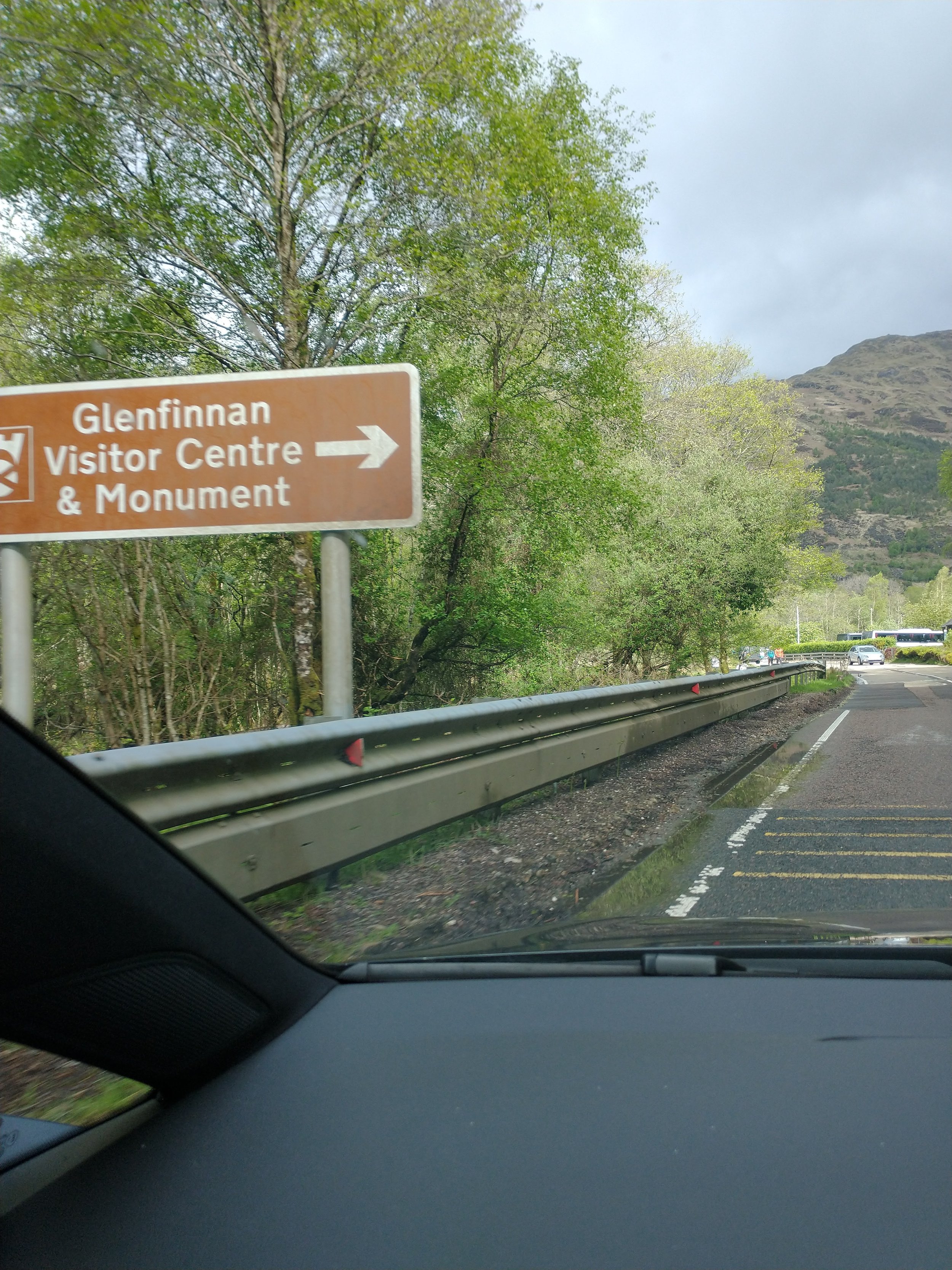 attraction-road-sign-for-glenfinnan-visitor-centre-in-scotland