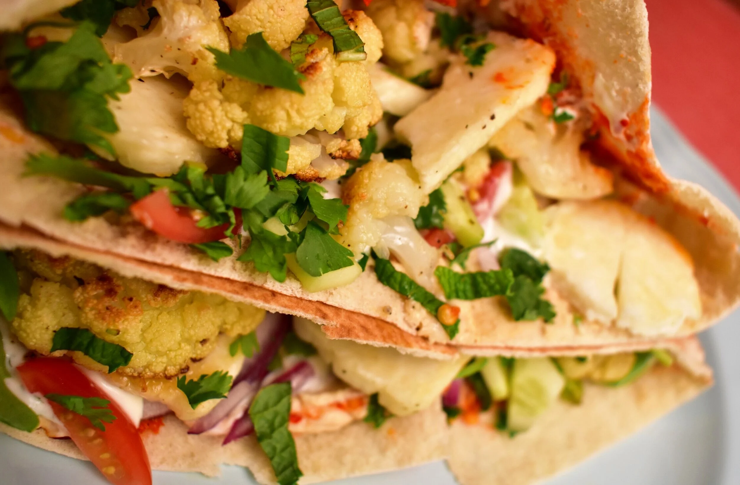 Charred Cauliflower, Halloumi, Harissa, and Hummus Pita