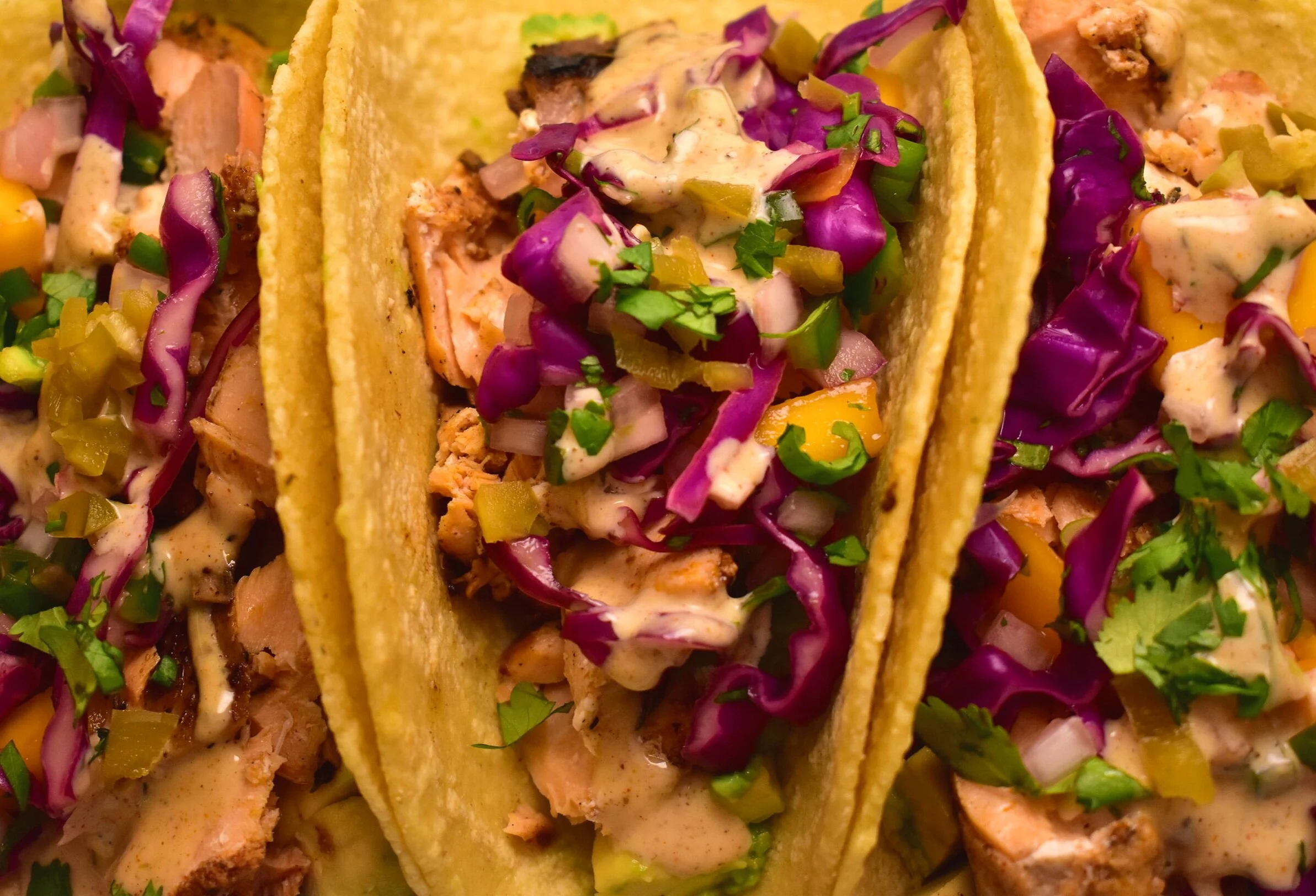 Jerk Salmon Tacos with Mango and Red Cabbage Slaw