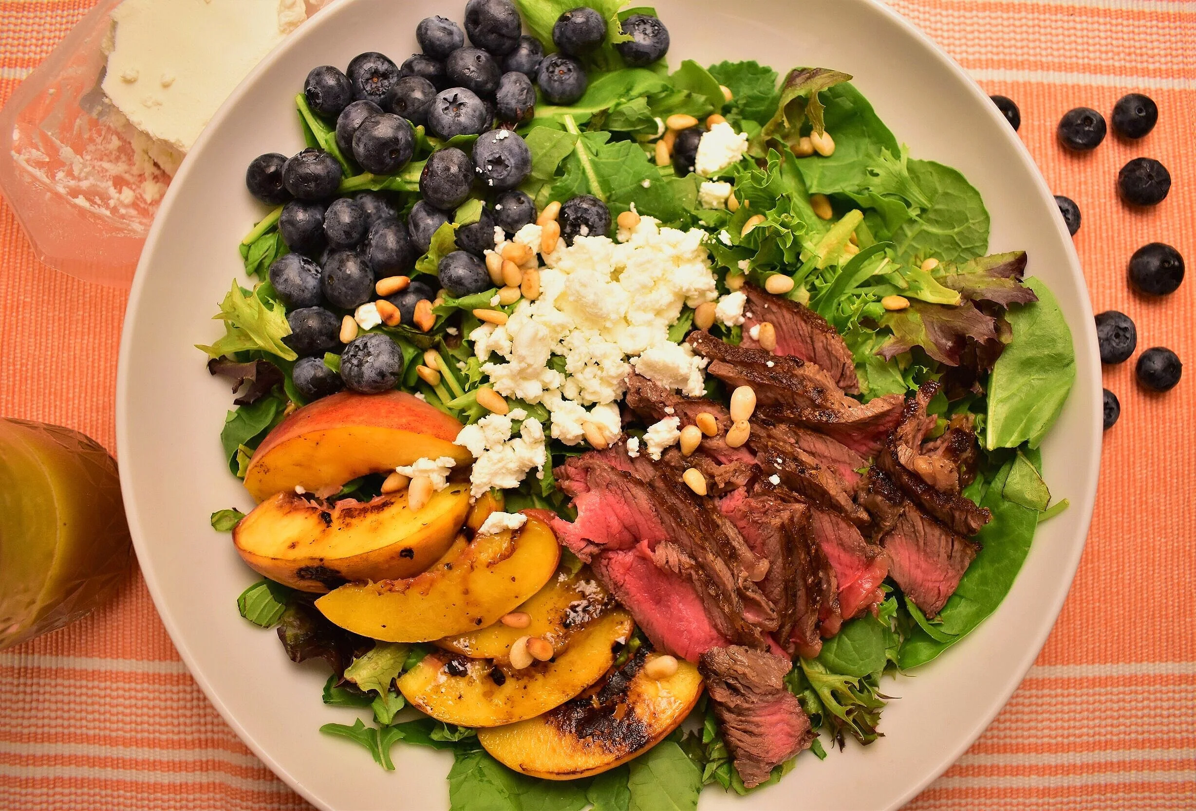Peach, Blueberry, Goat Cheese, and Steak Salad