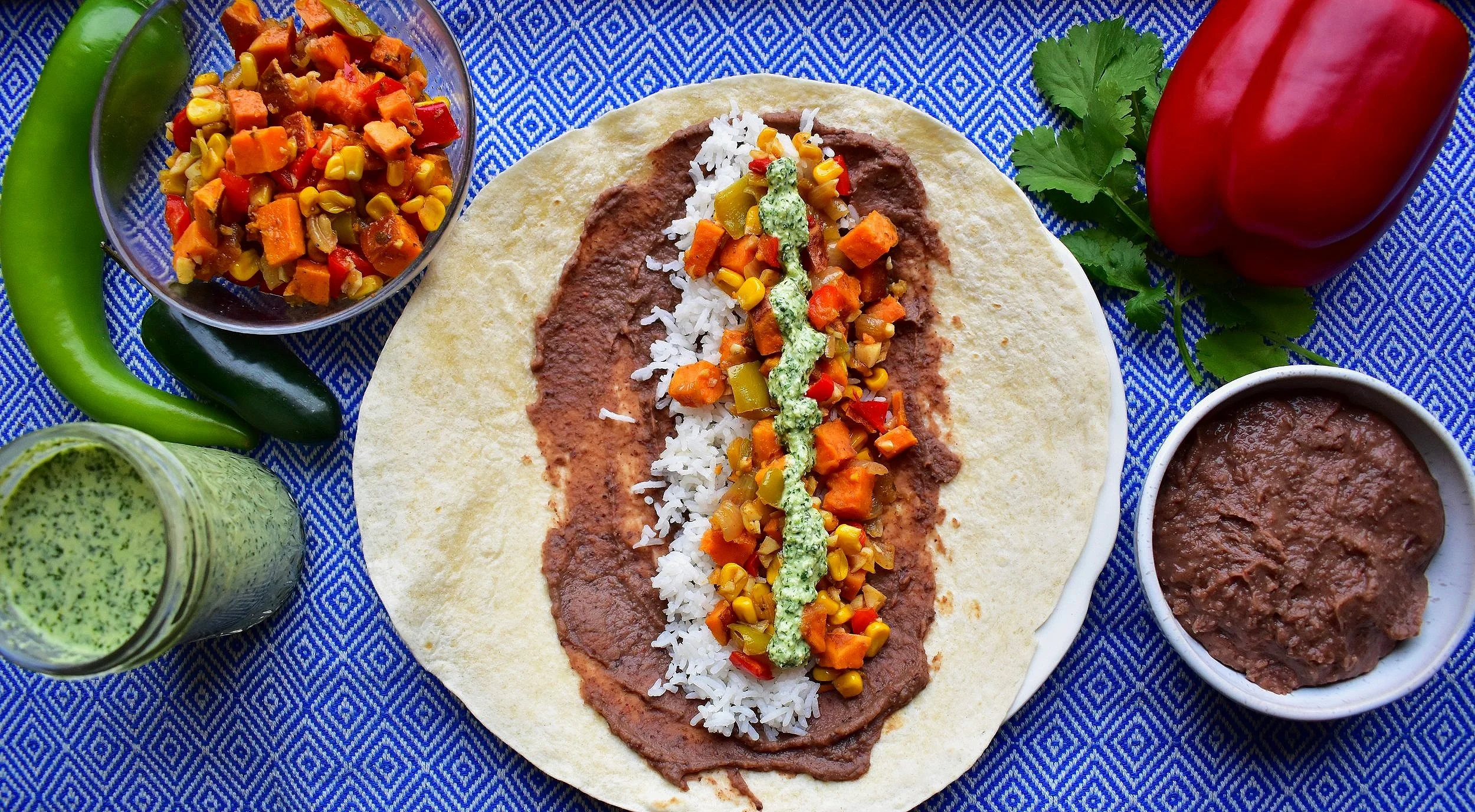 Vegan Veggie Burritos with Whipped Refried Beans and Aji Verde Sauce