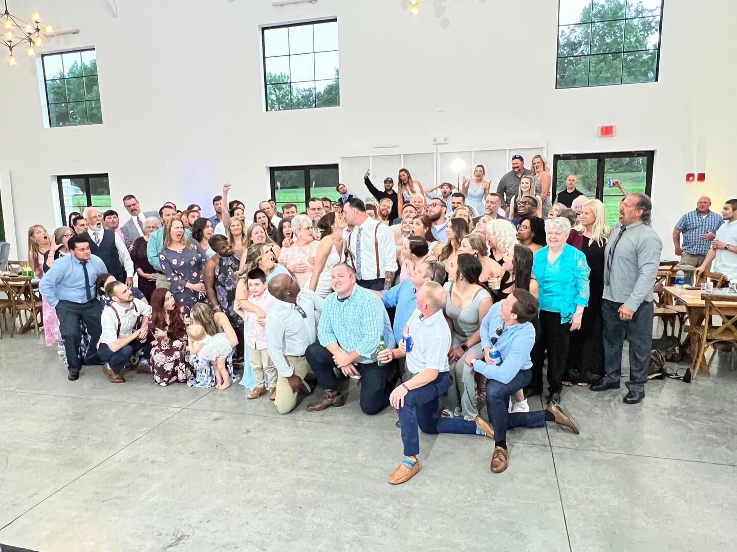 Best way to open the dance floor? Get the entire party together for a group photo then blast a Whitney Houston banger! 🎶💃🏽🕺🏼