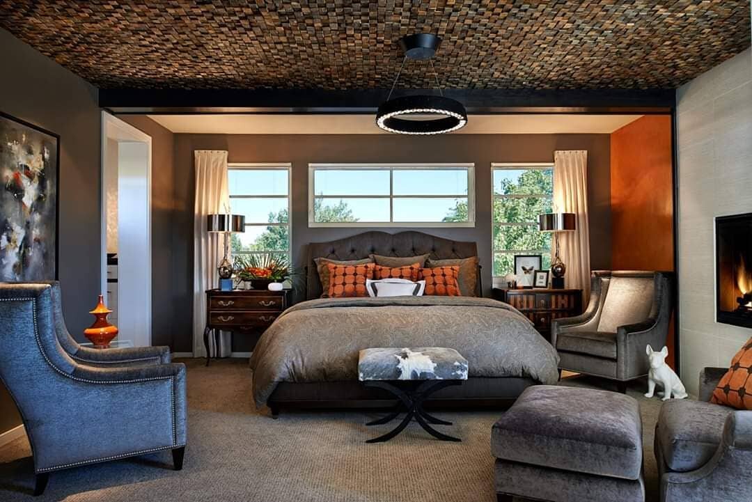 One of our favorite master bedrooms. The wood ceiling tiles add such a dramatic element. We love the dark, rich colors making this bedroom extra cozy. 
#masterbedroom #denverinteriordesign #denverdesigner #woodceiling #bedroomgoals