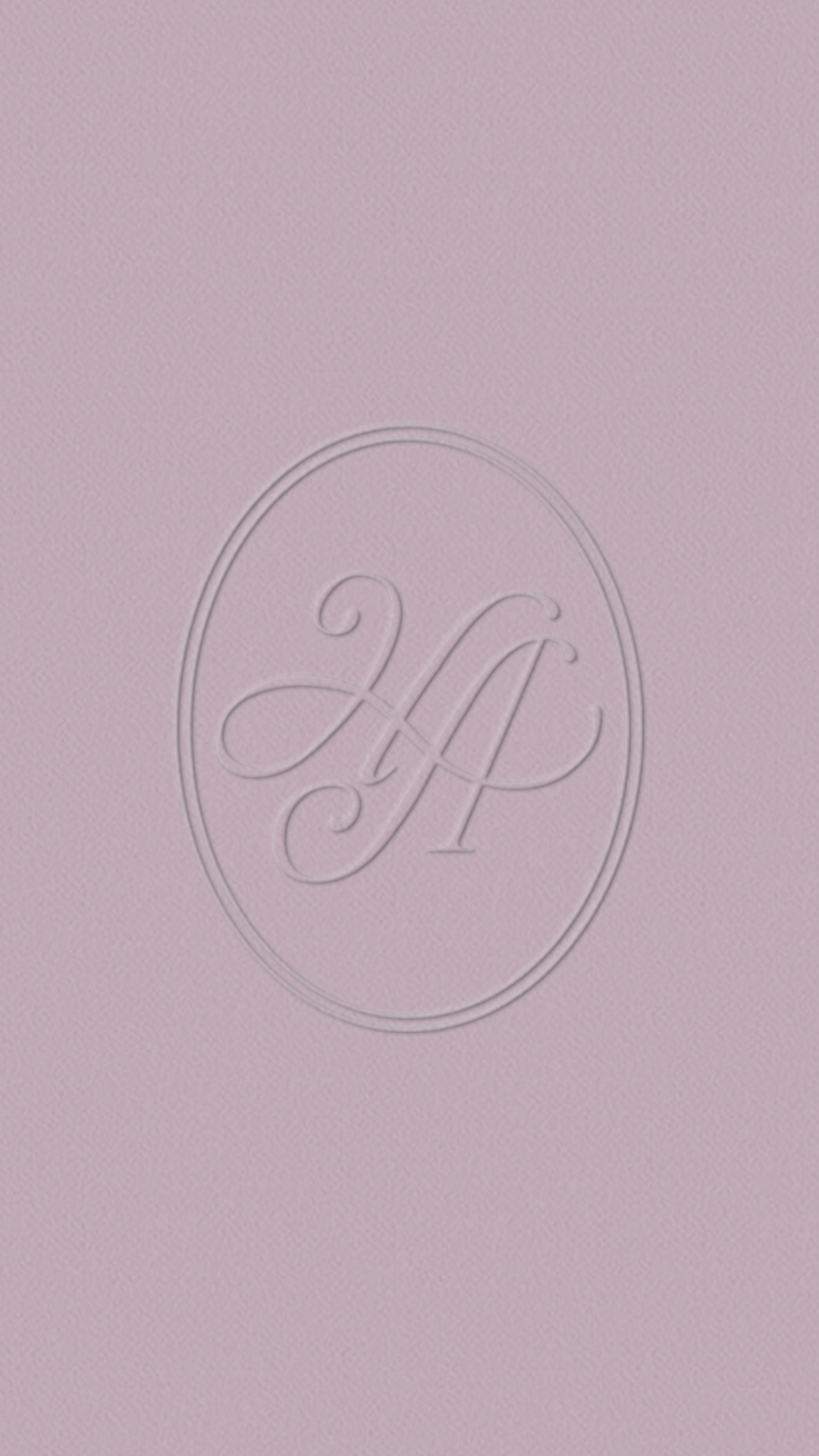Debossed oval HA monogram logo, Hannah Alyse Photography brand identity