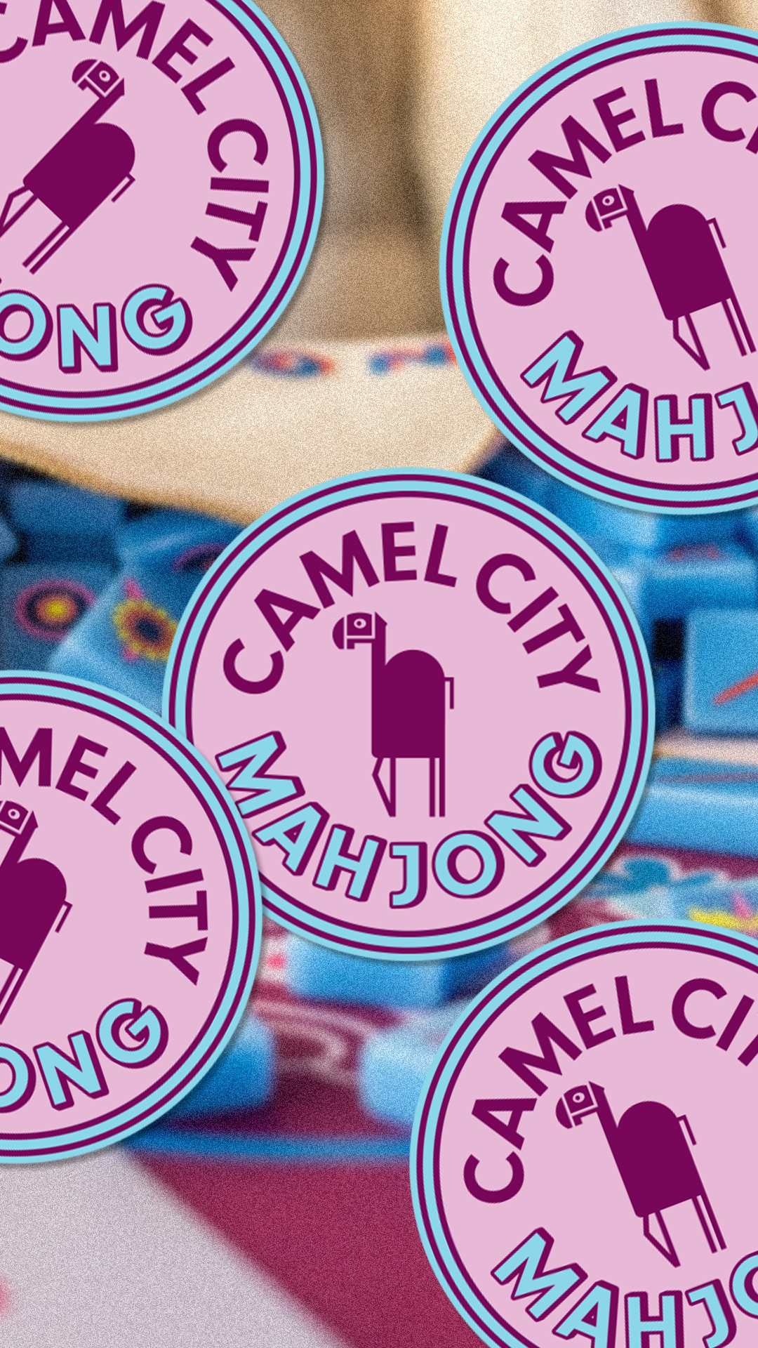 Camel City Mahjong circular logo stickers in pink and blue