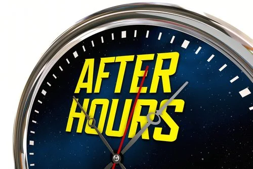 Close-up of a clock with the words 'After Hours' in bold yellow text on the face