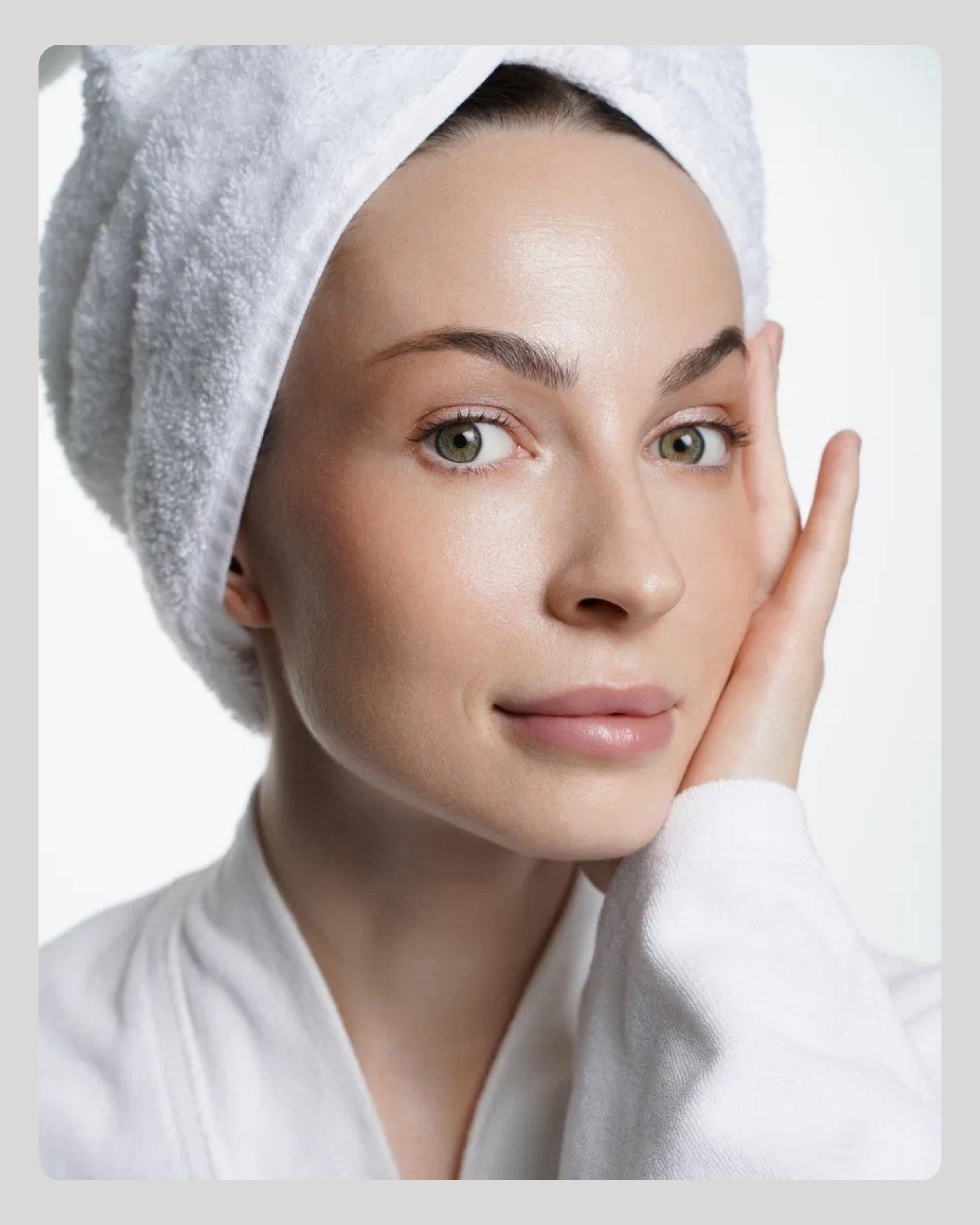 Woman using a facial gua sha tool