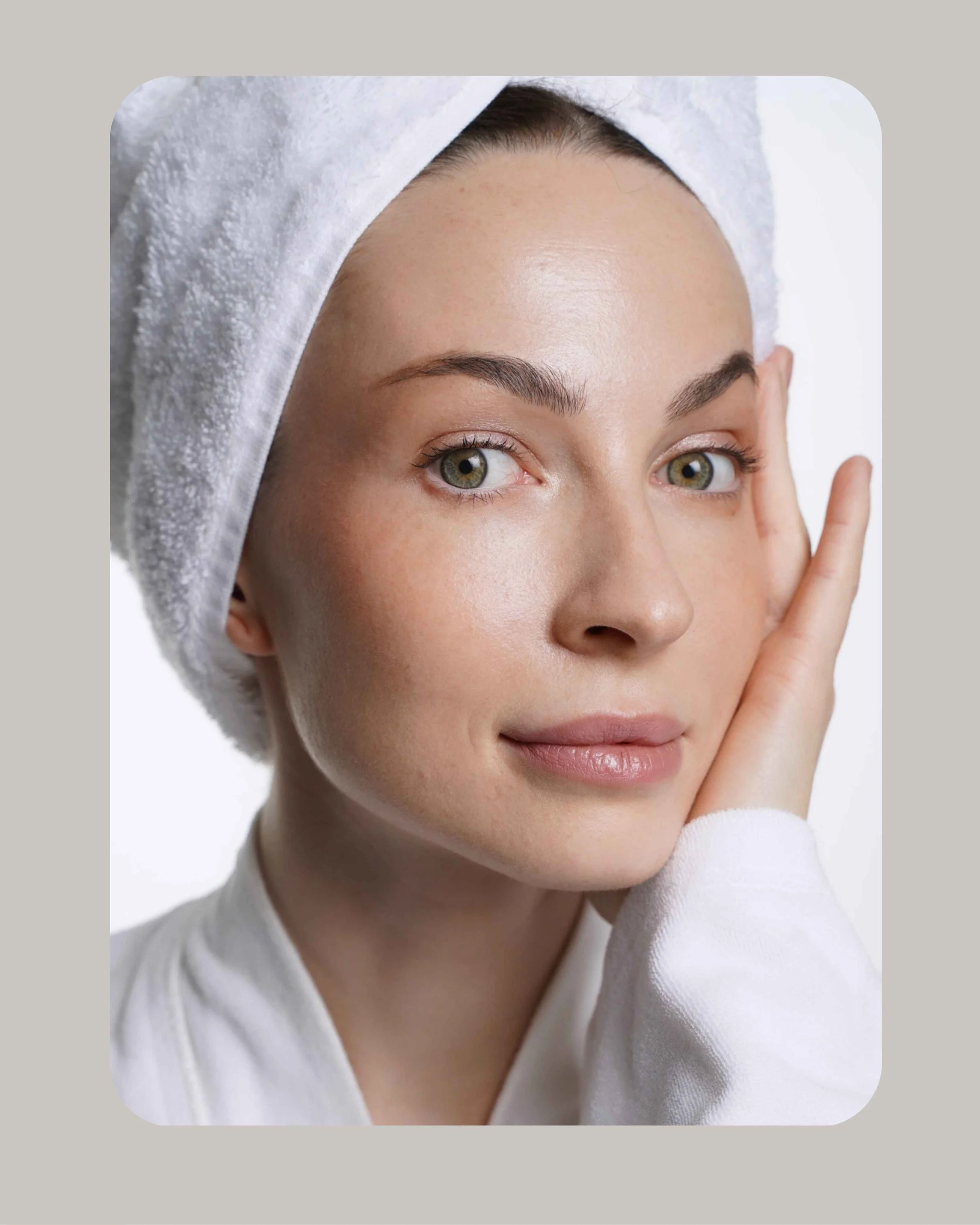Woman using a facial gua sha tool