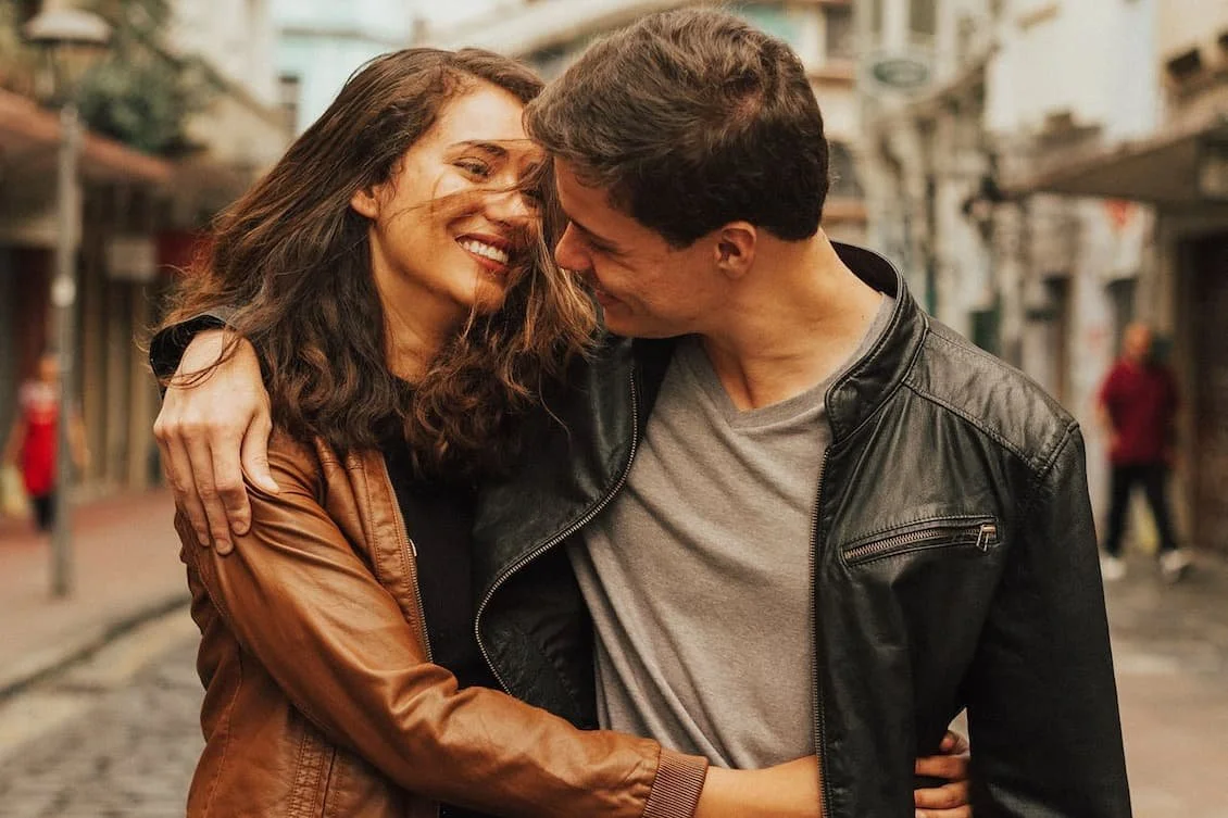 young-couple-embracing-in-the-street